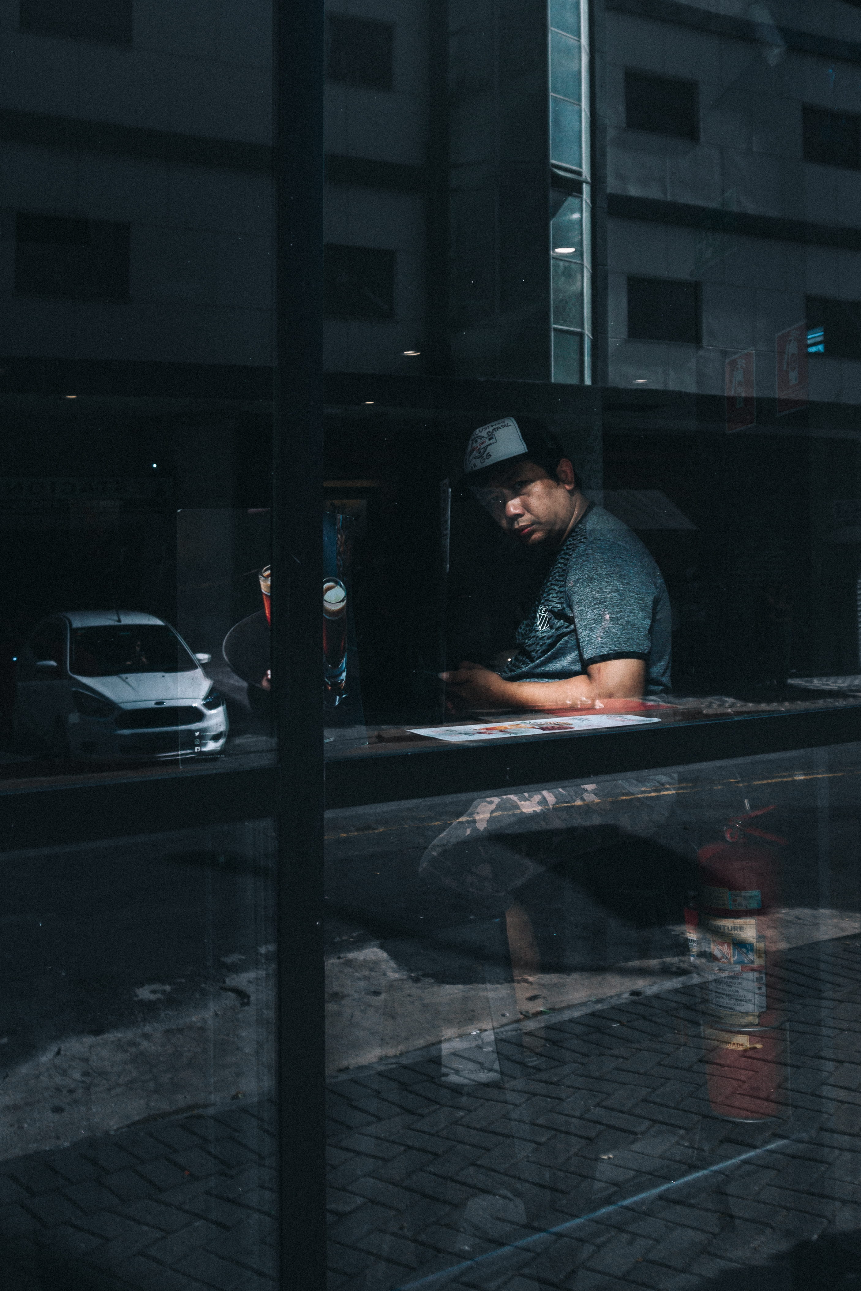 cap, fashionable, urban photography, person, transportation system, model, adult, urban, outfit, road, land vehicle, motor vehicle, sitting, night, man, Phone HD Wallpaper