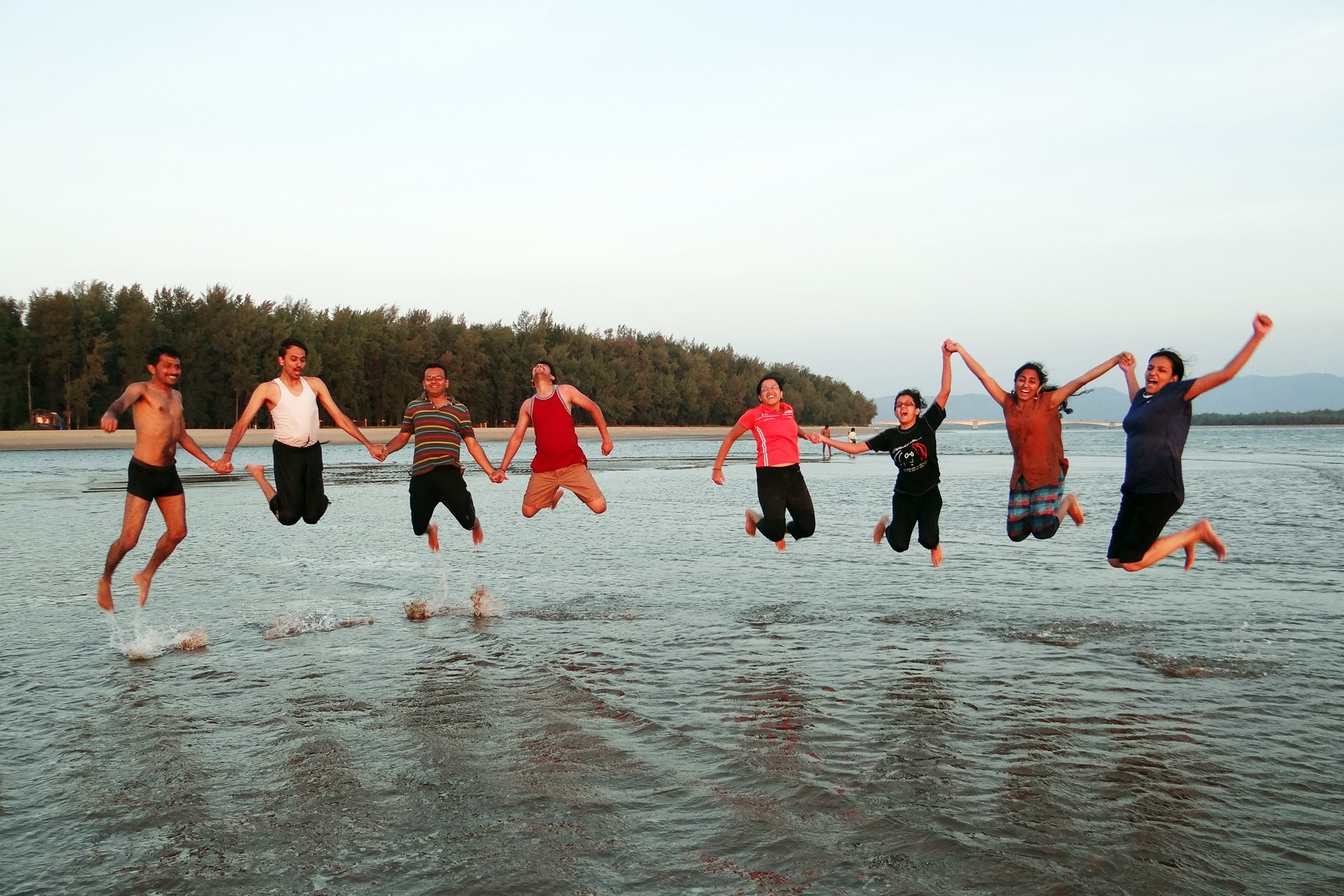 youngsters, people, human arm, sky, jumping, adult, group of people, karwar, body part, water, waterfront, arabian sea, day, copy space, nature, real people, HD Wallpaper