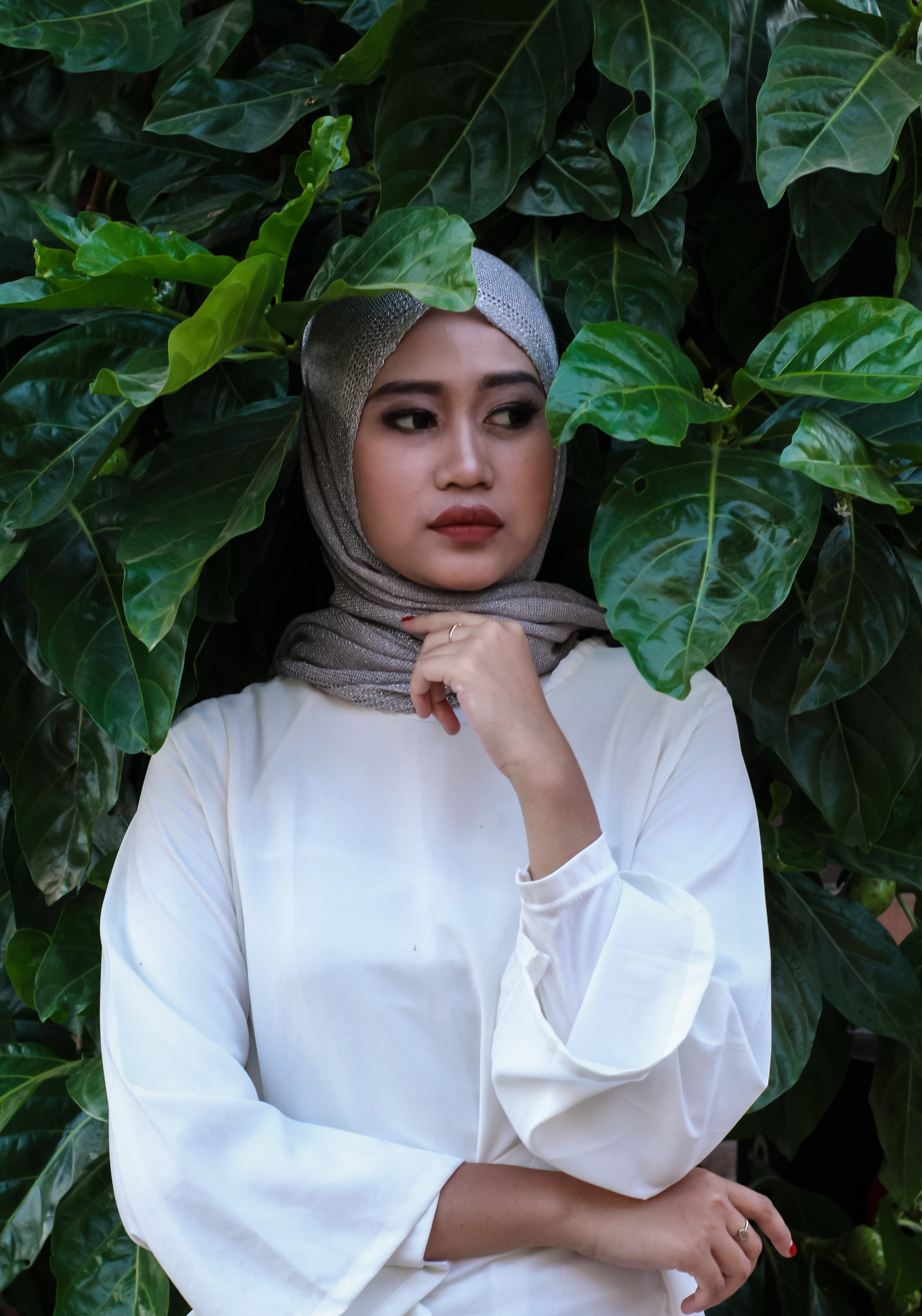 one person, leisure activity, plant part, muslim, contemplation, real people, green color, leaf, adult, hijab, growth, beautiful, leaves, front view, young women, Phone HD Wallpaper