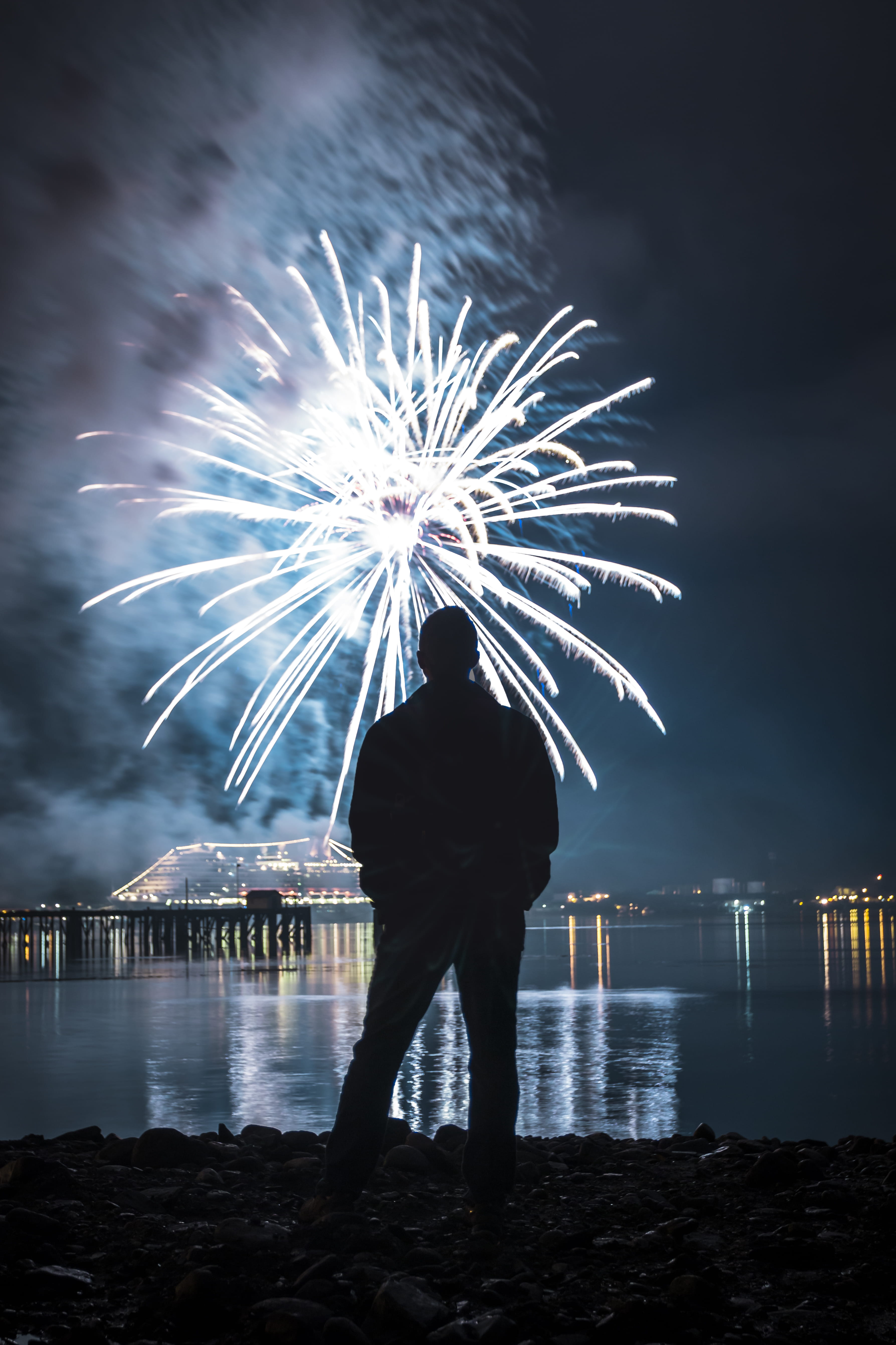 standing, water, firework, exploding, long exposure, rear view, outdoors, one person, firework - man made object, illuminated, fourth of july, arts culture and entertainment, Phone HD Wallpaper