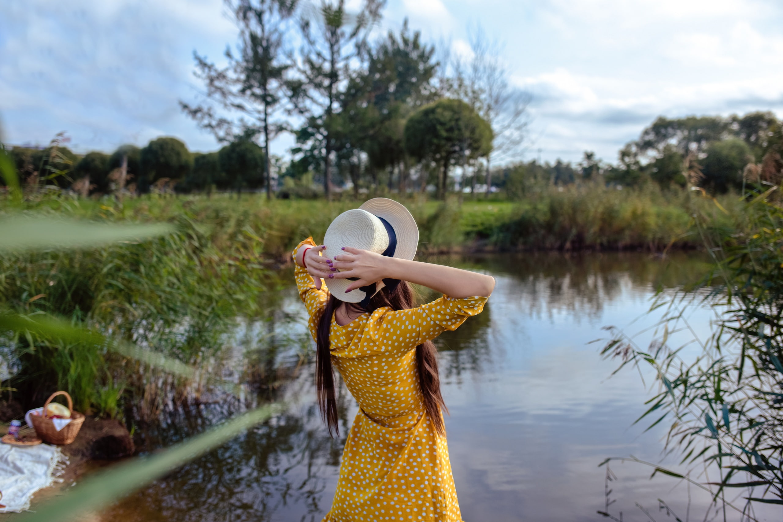 dress, outdoors, women outdoors, long hair, painted nails, brunette, model, depth of field, 2K, water, baskets, lagoon, hat, yellow dress, women with hats, HD Wallpaper