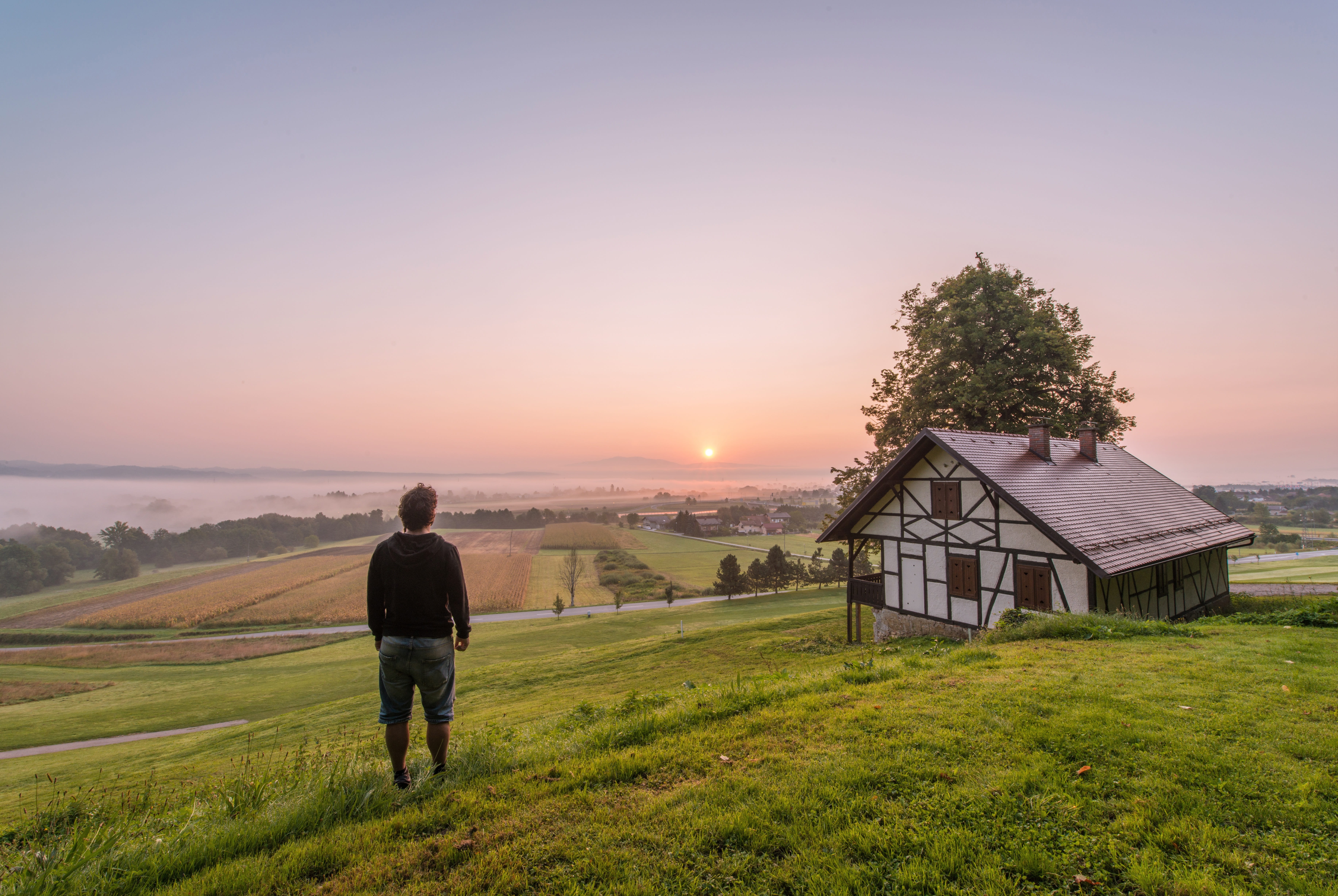 near, lifestyles, sky, town, scenics - nature, outdoors, fields, person, guy, real people, sunset, village, green, beauty in nature, rural, plant, daytime, HD Wallpaper