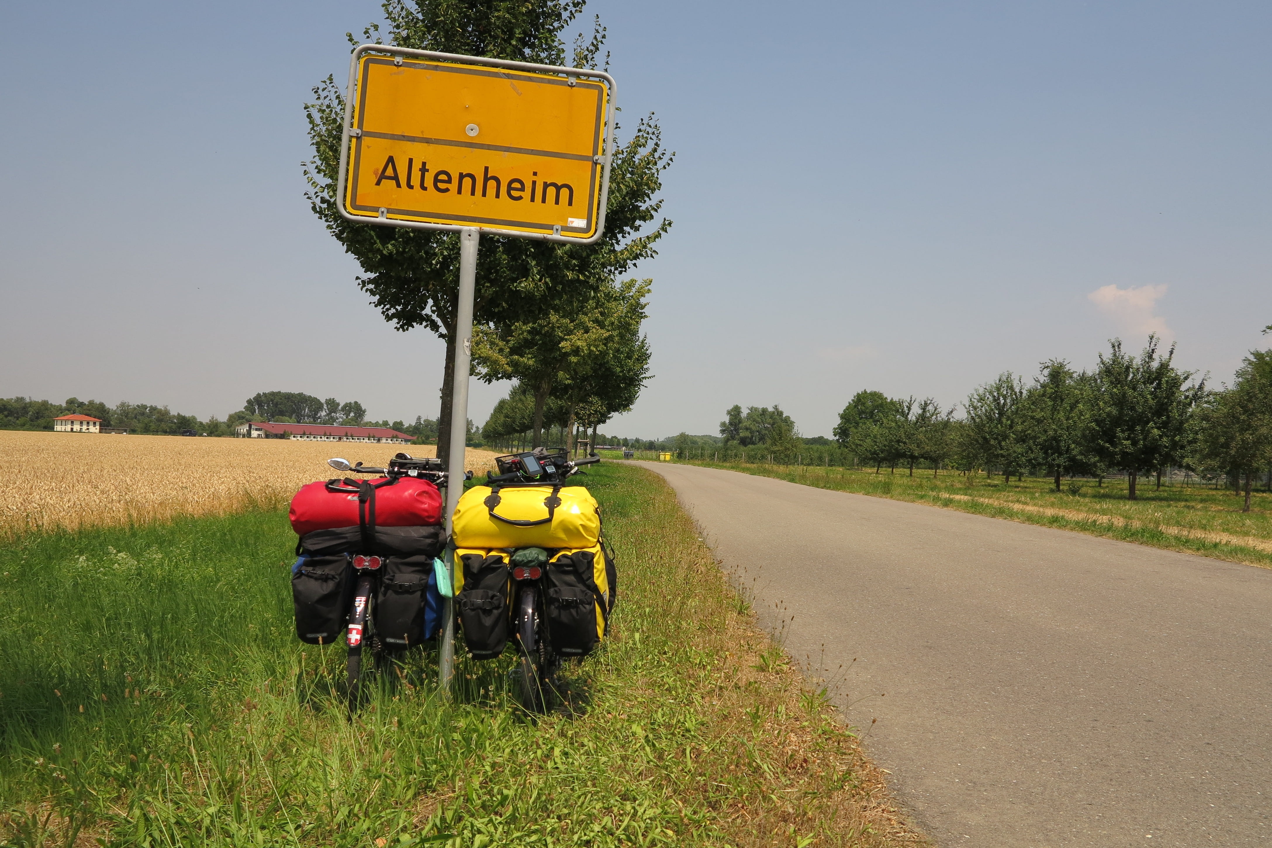 two wheeled vehicle, mode of transportation, day, germany, tree, communication, plant, retirement home, road, direction, 4K, sign, grass, packed, wheels, HD Wallpaper