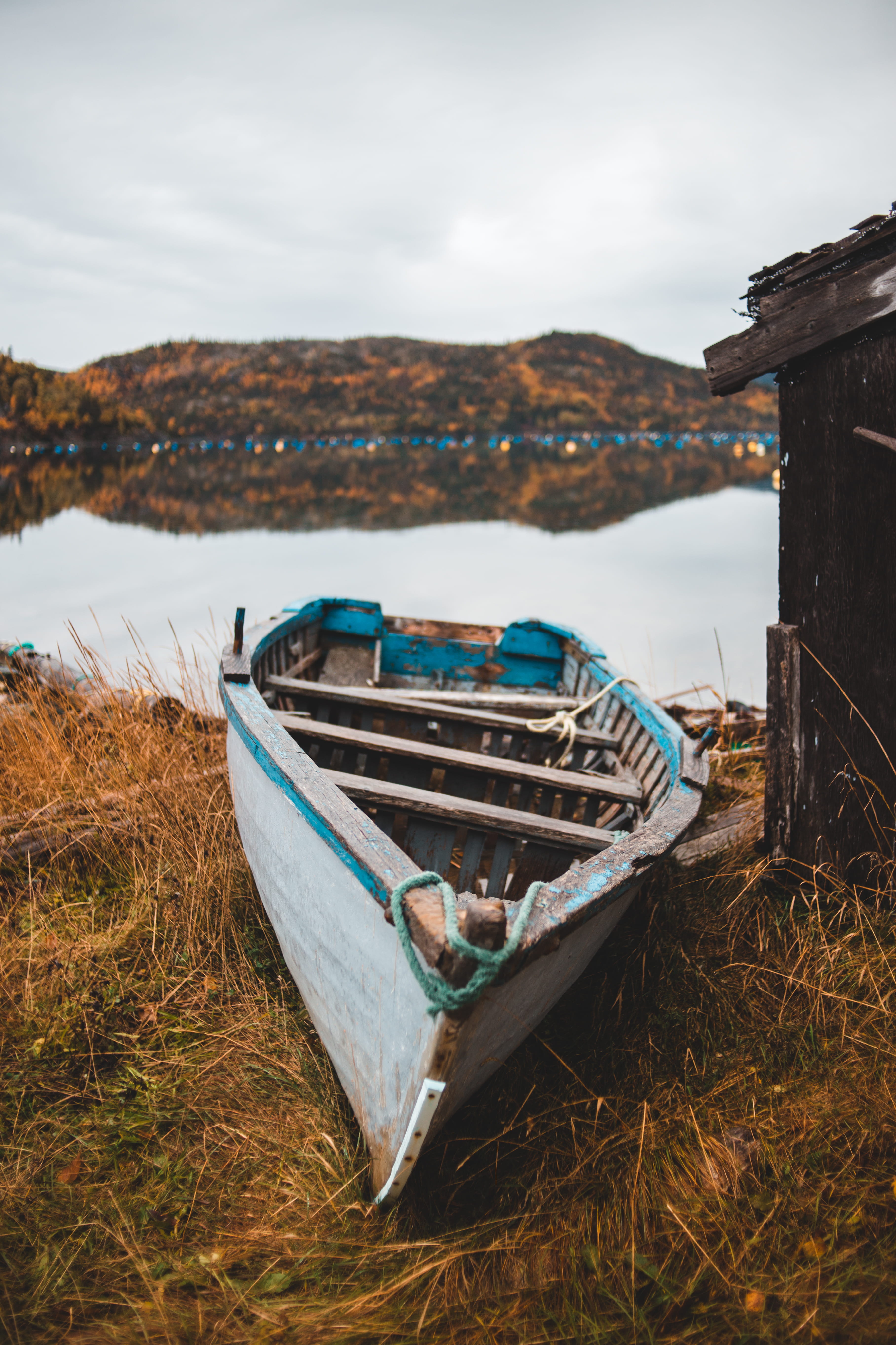 body, shed, obsolete, autumn, mode of transportation, field, sail, ruined, day, plant, building, old, hill, wood, near, deterioration, lake, cloud - sky, Phone HD Wallpaper