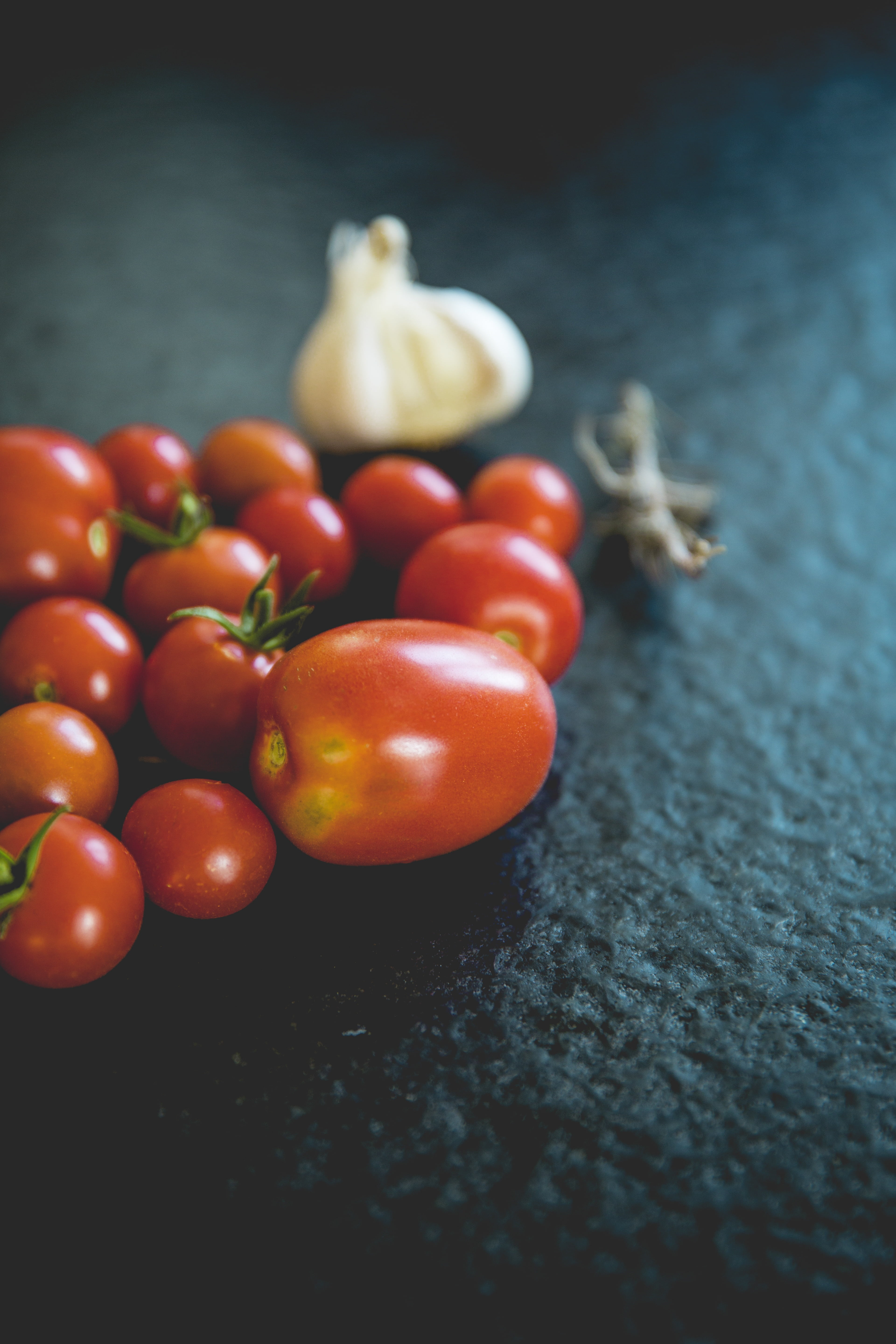 datailaufnahme, selective focus, tomatoes, close-up, cherry tomato, red, black background, vegetable, wellbeing, vegetarian Food, still life, vegetables, Phone HD Wallpaper