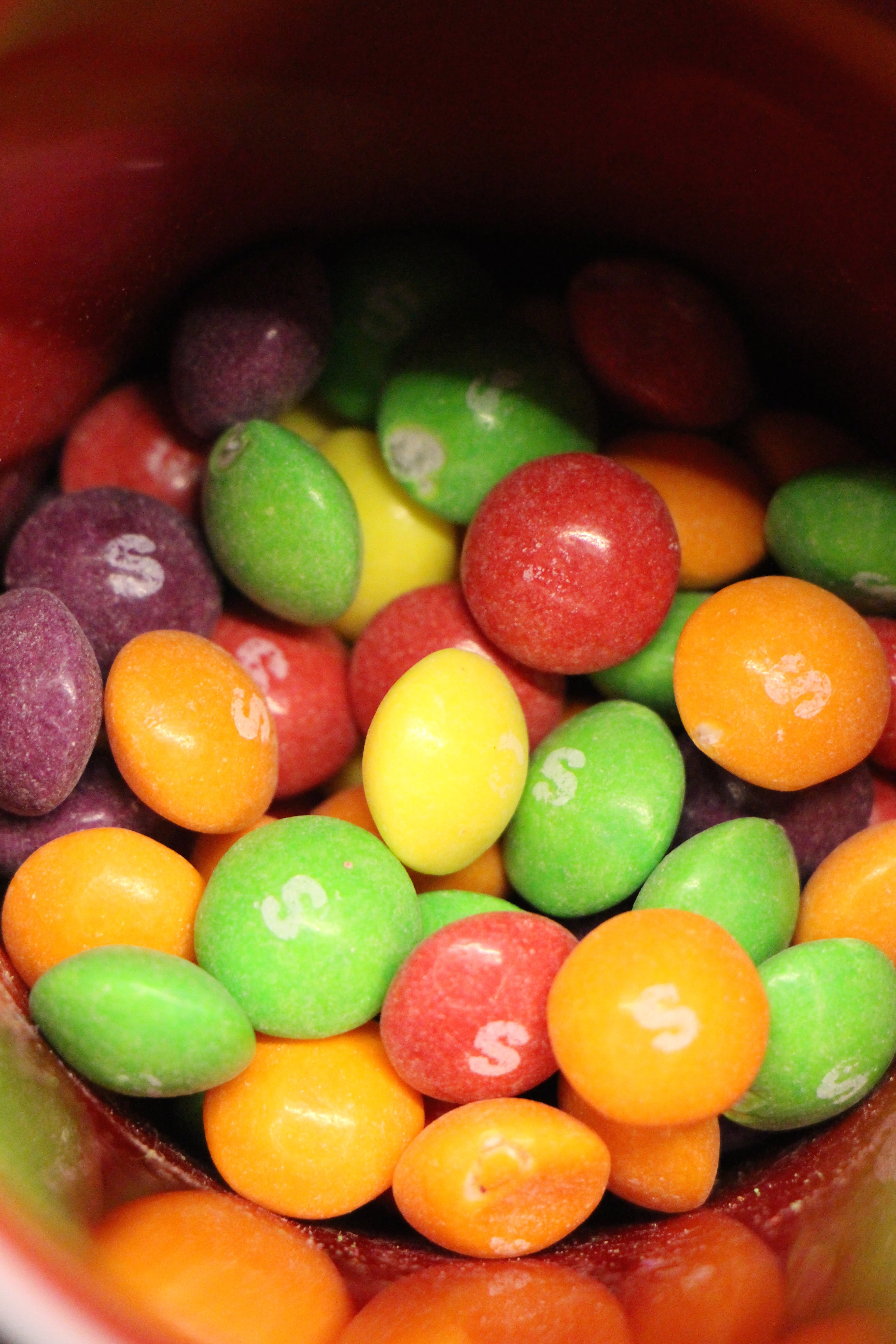 chocolate lentils, no people, multi colored, smarties, freshness, colorful, baked, still life, indulgence, cake, food, large group of objects, snack, sweet food, Phone HD Wallpaper