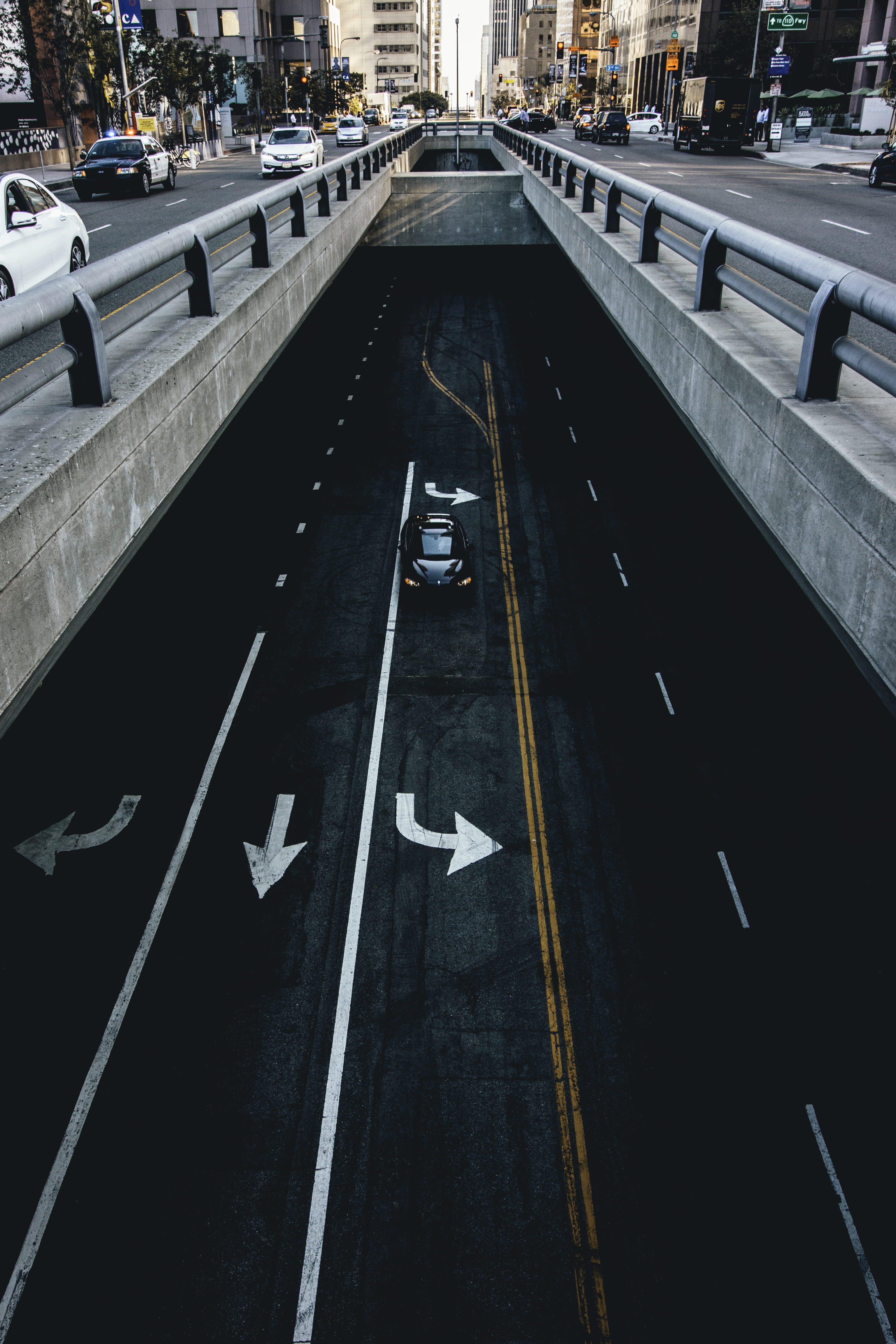 road, los angeles, left turn, no people, train track, car, direction, outdoors, architecture, tunnel, rail, city, motor vehicle, vehicle, urban, sign, 4K, Phone HD Wallpaper