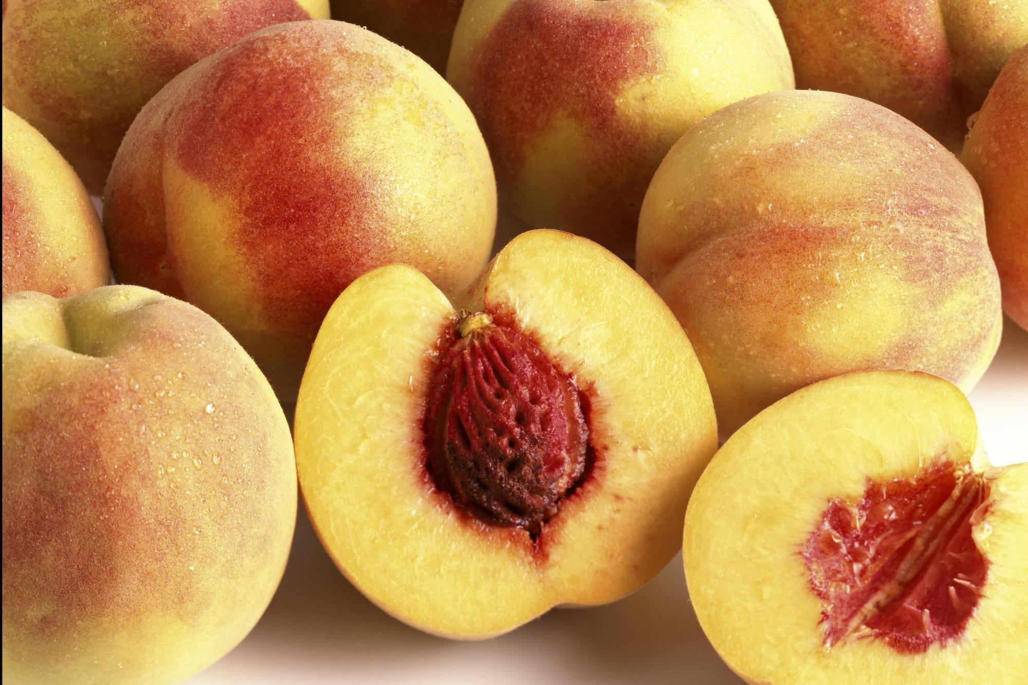agriculture, yellow, food And Drink, peaches, dieting, food, halves, indoors, freshness, organic, bone, healthy Eating, backgrounds, cross section, full frame, HD Wallpaper