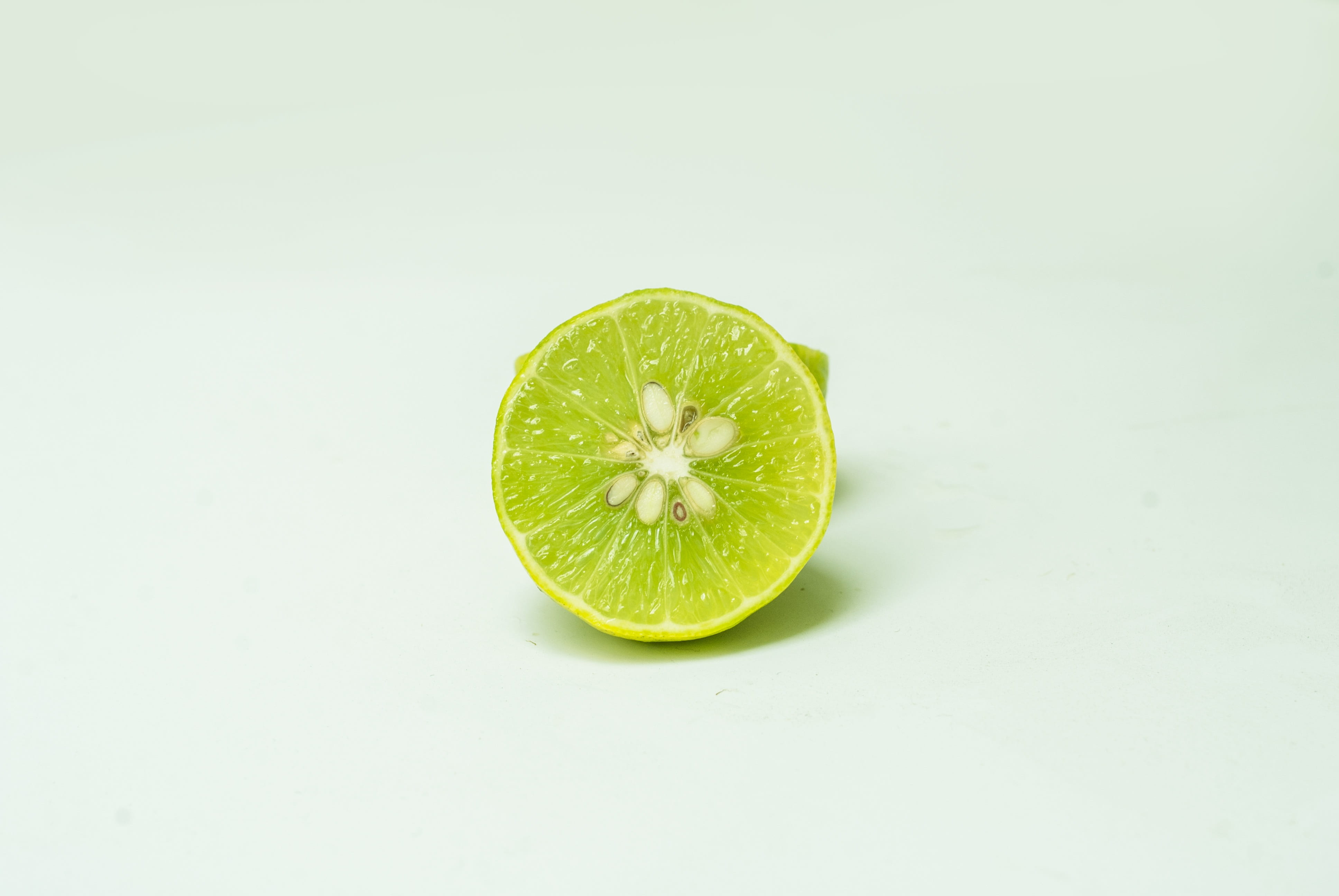 cross section, green color, citrus fruit, citric, still life, white background, wellbeing, freshness, ripe, lemon, fruit, slice, lime, studio shot, close-up, HD Wallpaper