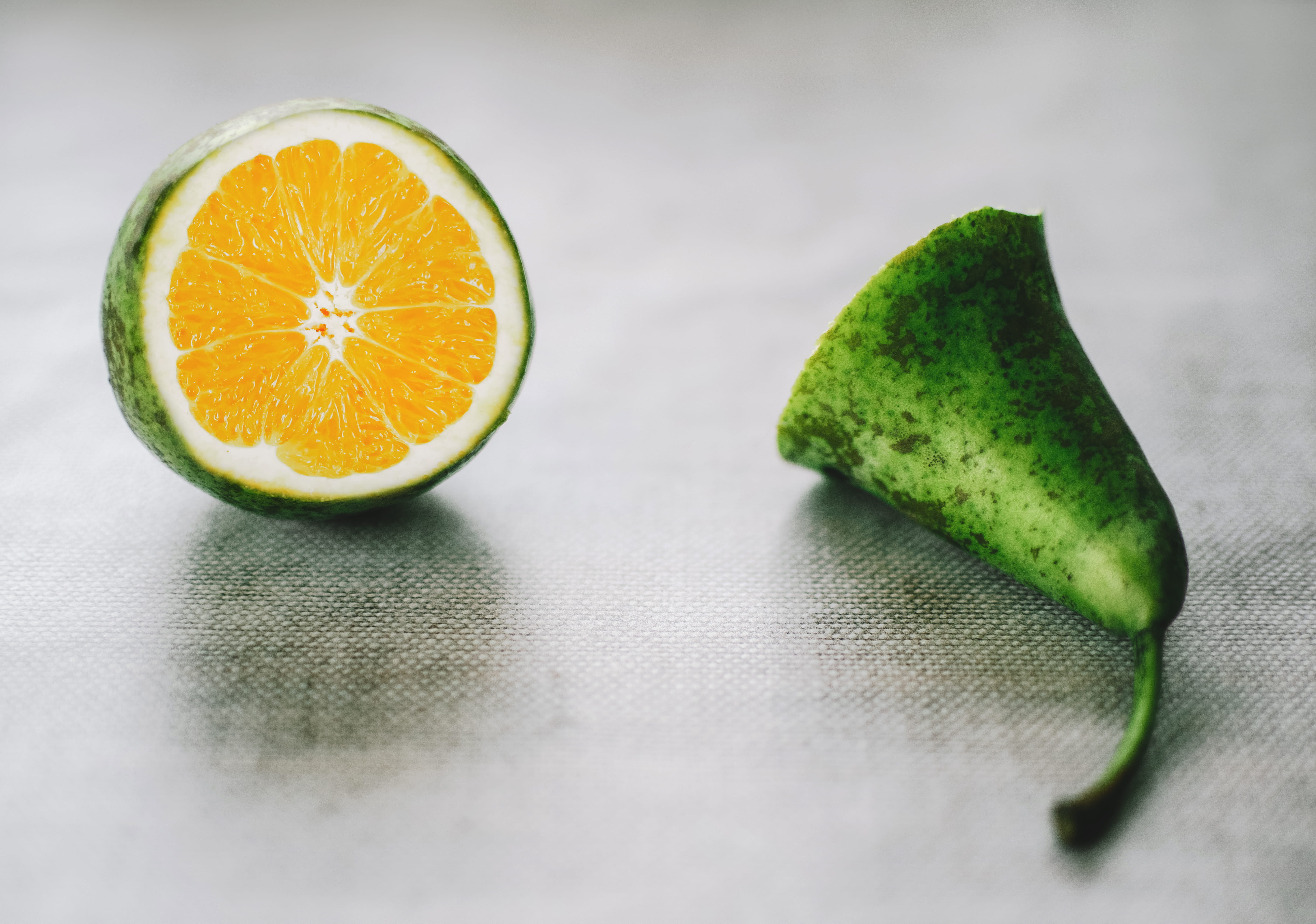 citrus, round, orange color, wellbeing, green color, surface, halved, juice, ripe, indoors, color, citrus fruit, healthy eating, lime, half, fresh, selective focus, HD Wallpaper