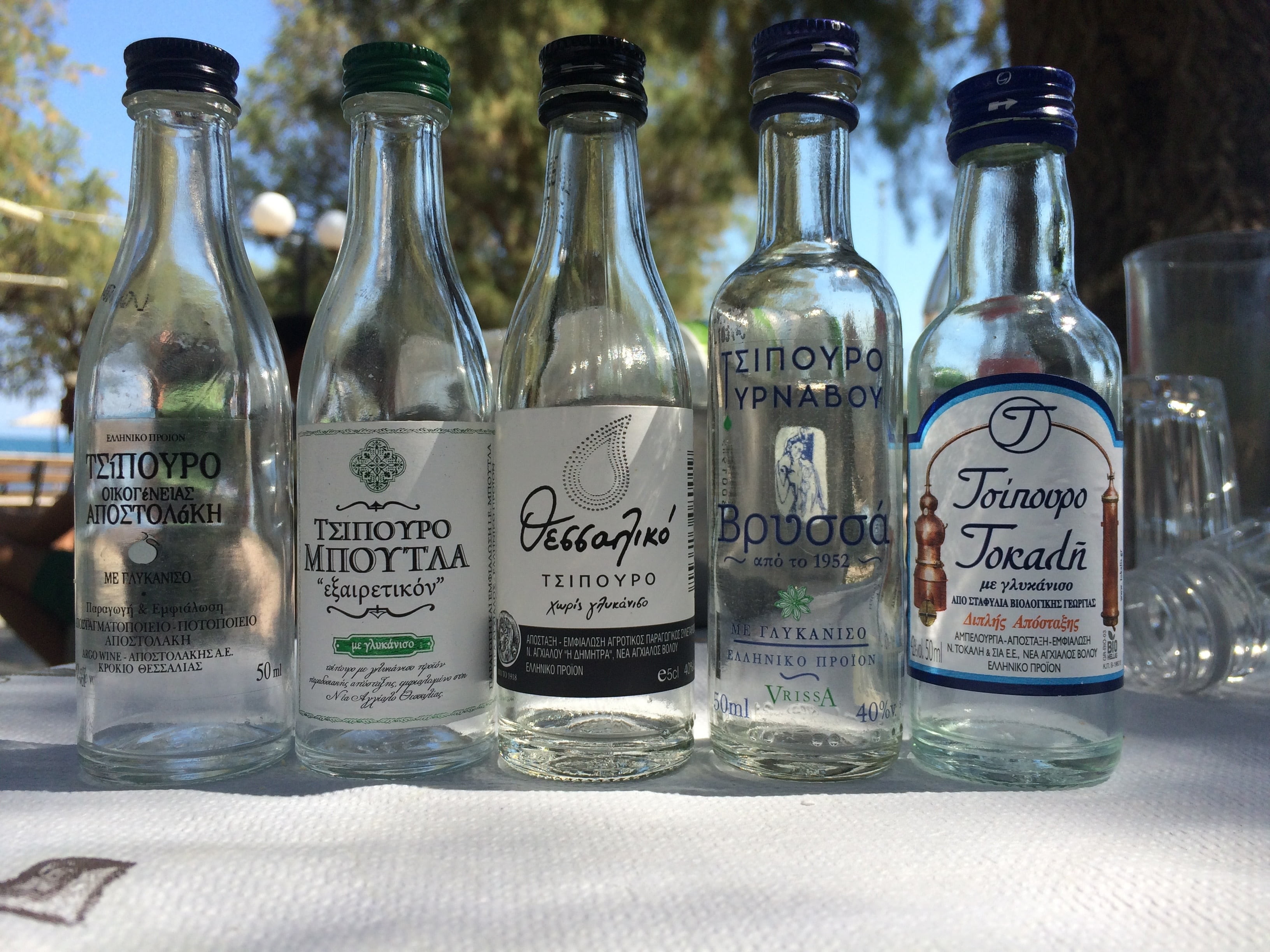 no people, western script, close-up, choice, focus on foreground, label, indoors, greek, ouzo, healthcare and medicine, container, 2K, transparent, table, HD Wallpaper