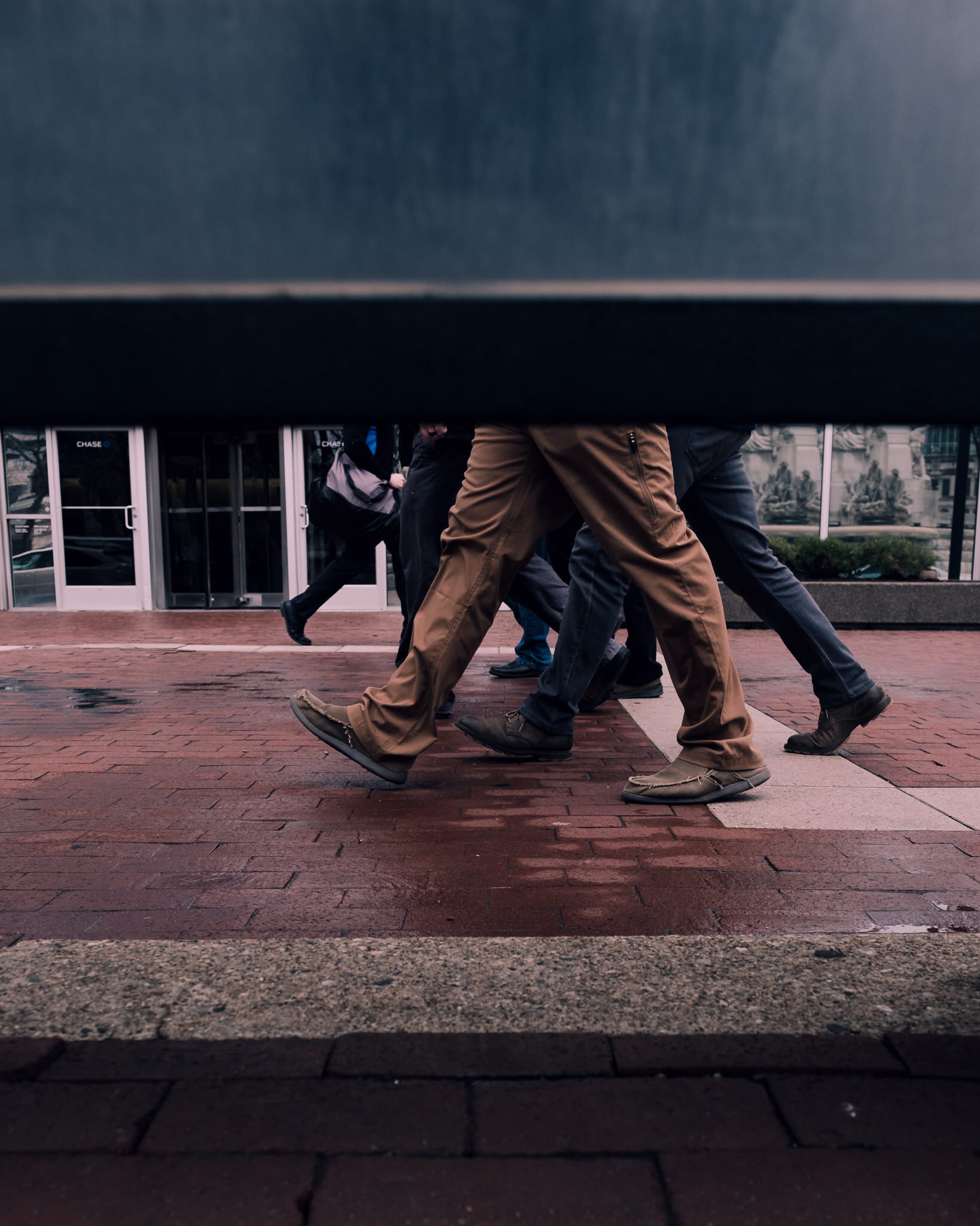 sitting, shoe, brown, floor, day, indiana, concrete, stroll, ground, human body part, 1080P, footpath, architecture, built structure, leg, outdoors, men, Phone HD Wallpaper