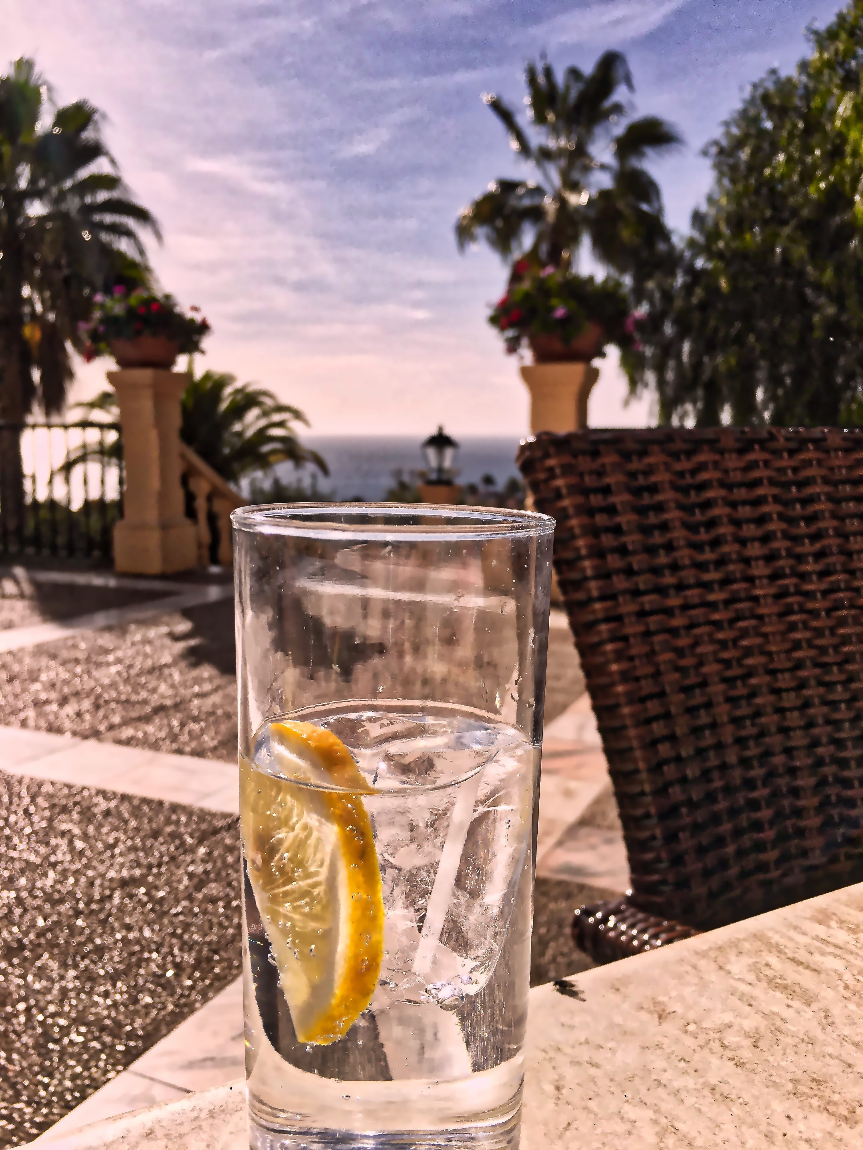 drinking glass, fruit, lemon, detox water, close-up, healthy eating, glass, refreshing, view, nature, drink, focus on foreground, alcohol, day, blur, 4K, Phone HD Wallpaper