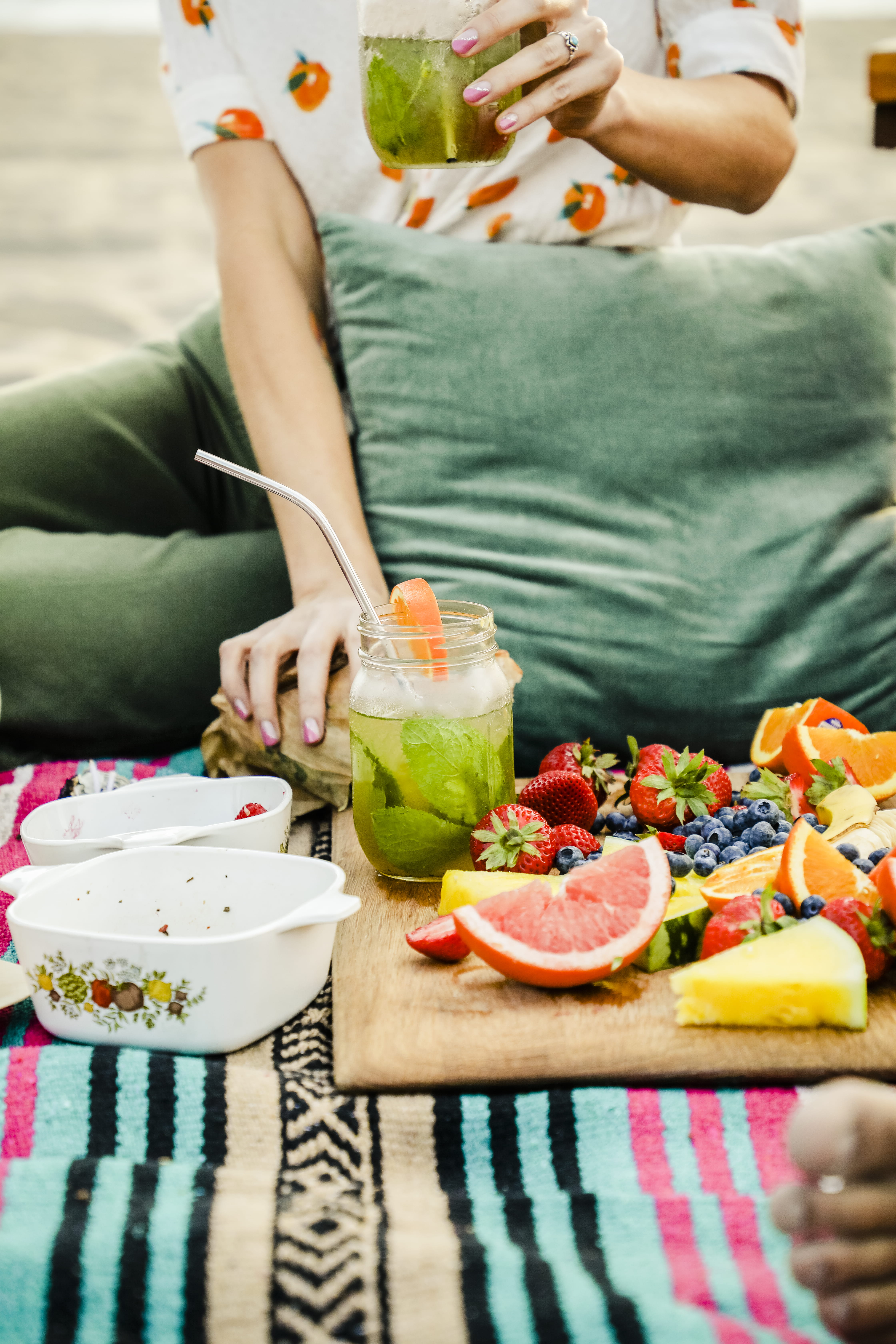 wellbeing, indoors, healthy eating, fruits, hand, human body part, one person, sitting, throw pillow, wooden board, food and drink, blueberries, table, Phone HD Wallpaper