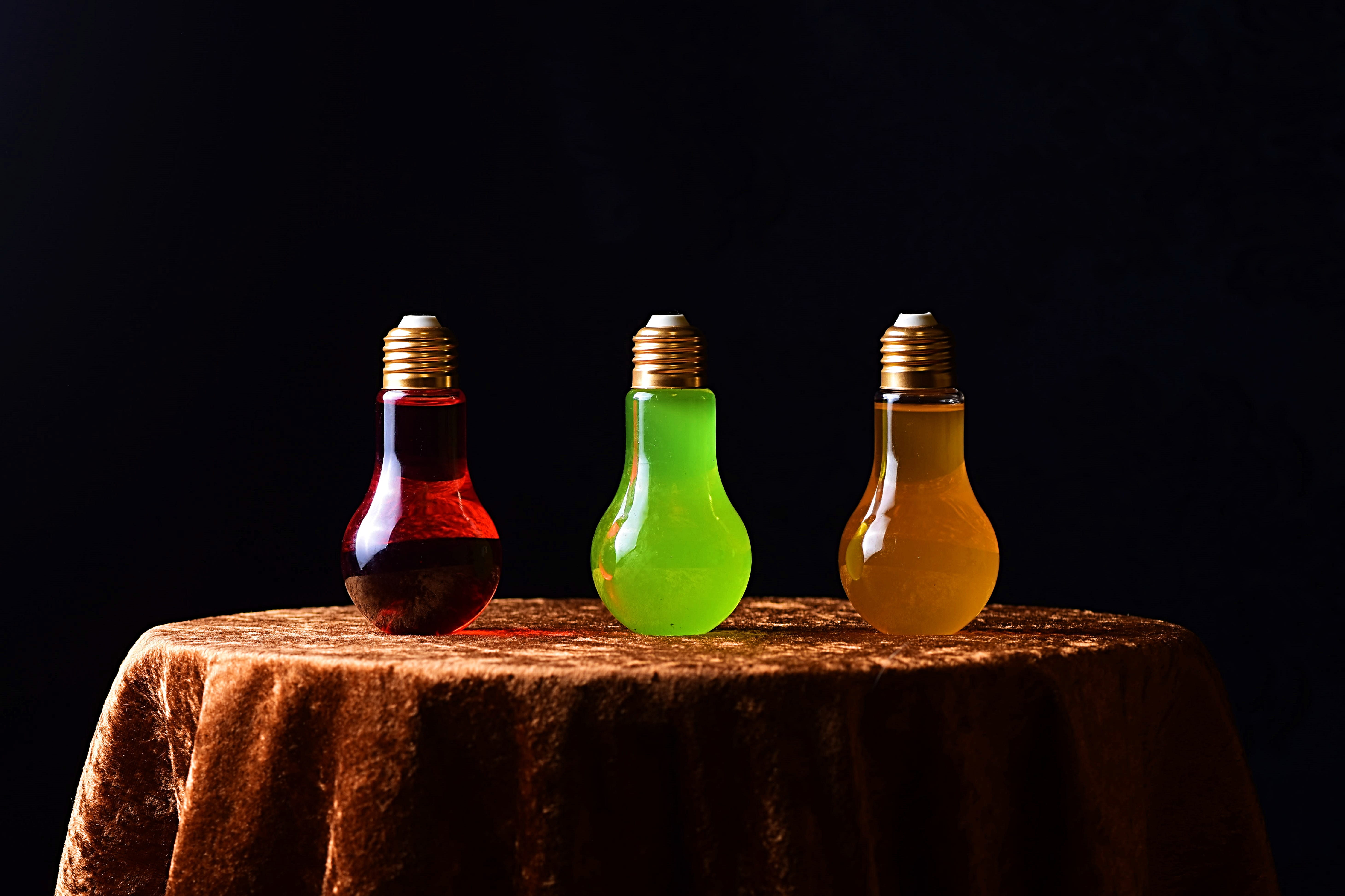 decoration, energy drinks, glass - material, liqueur, bottle, light bulbs, alcohol, green color, black background, studio shot, indoors, beverages, table, HD Wallpaper