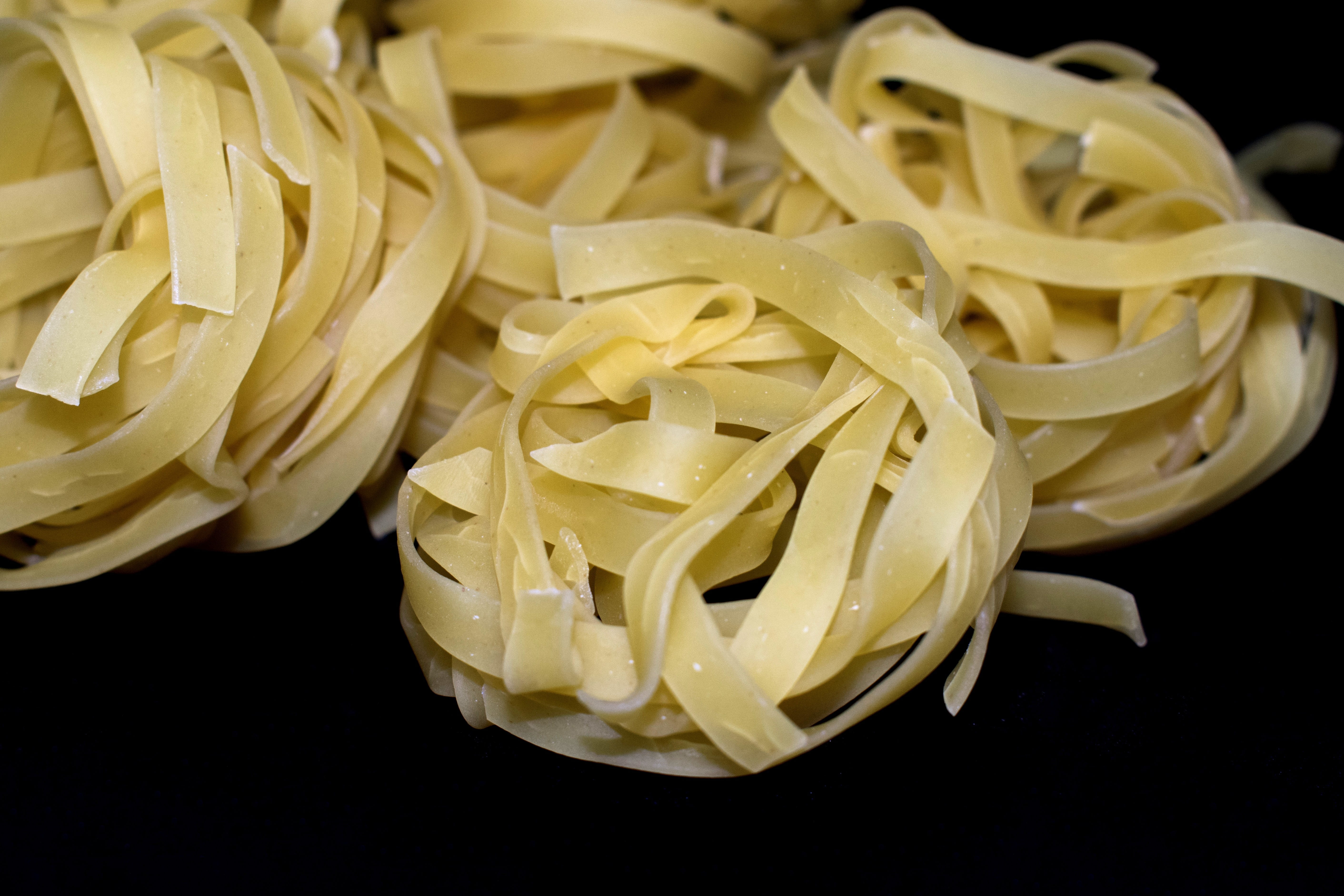 no people, italian food, pasta, food, still life, spaghetti, food and drink, close-up, freshness, background, yellow, raw food, indoors, black background, HD Wallpaper