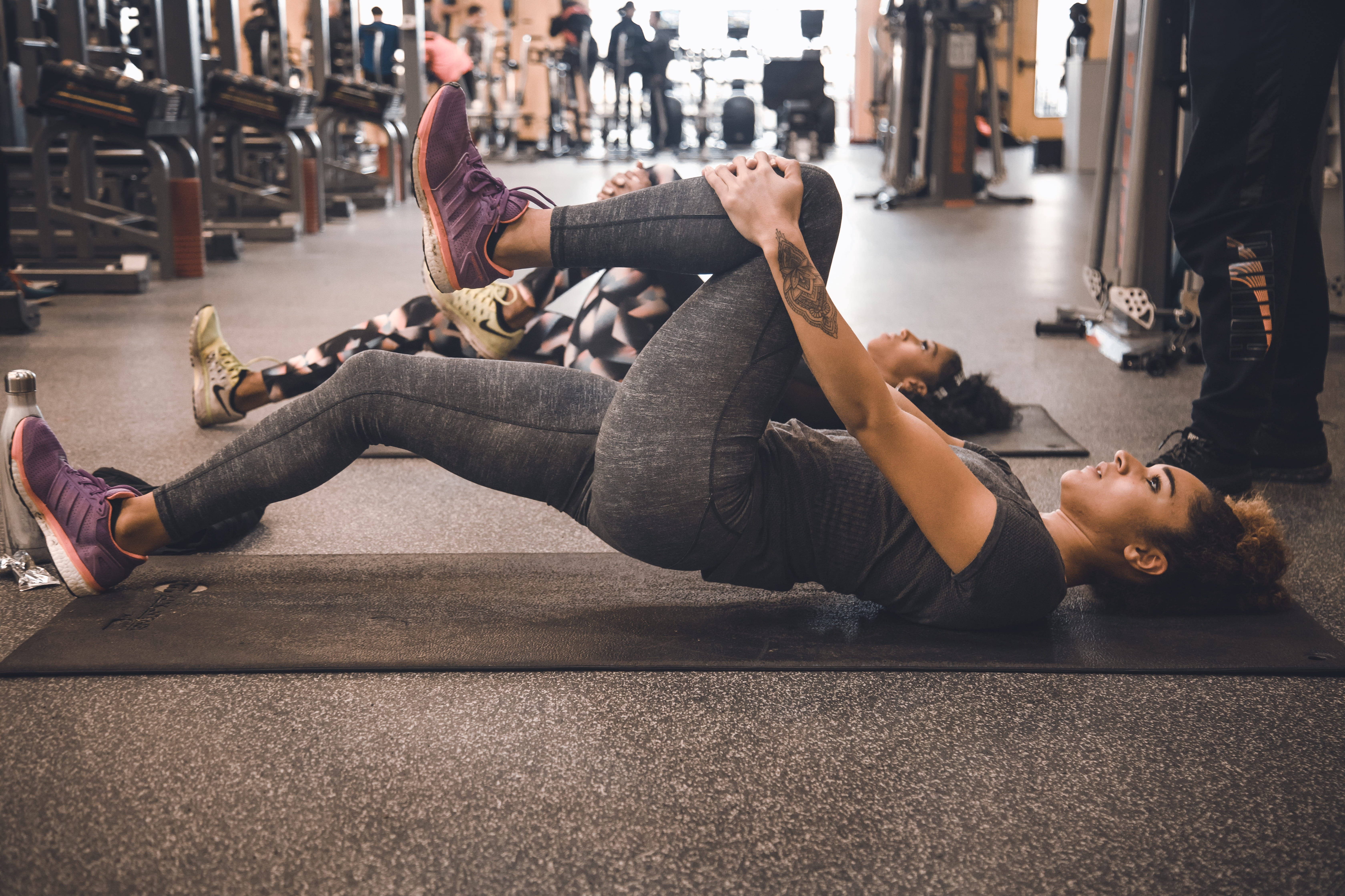 full length, adult, female, sports clothing, lying on back, sports training, flooring, gymnasium, wellbeing, men, sport, muscular build, healthy lifestyle, HD Wallpaper