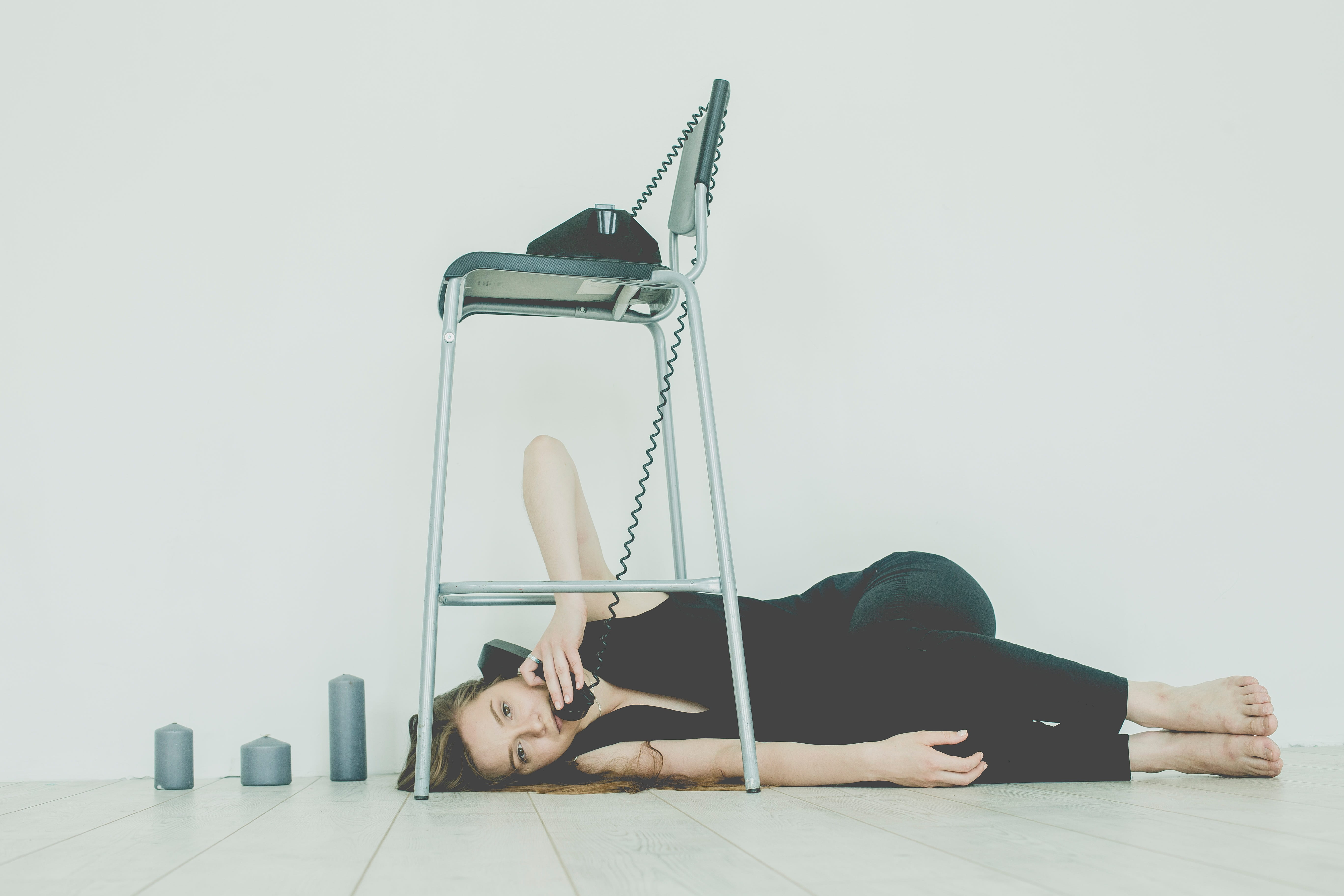 healthy lifestyle, lying down, leisure activity, wellbeing, phone, real people, telephone, talking on phone, beautiful woman, relaxation, one person, wood floor, HD Wallpaper