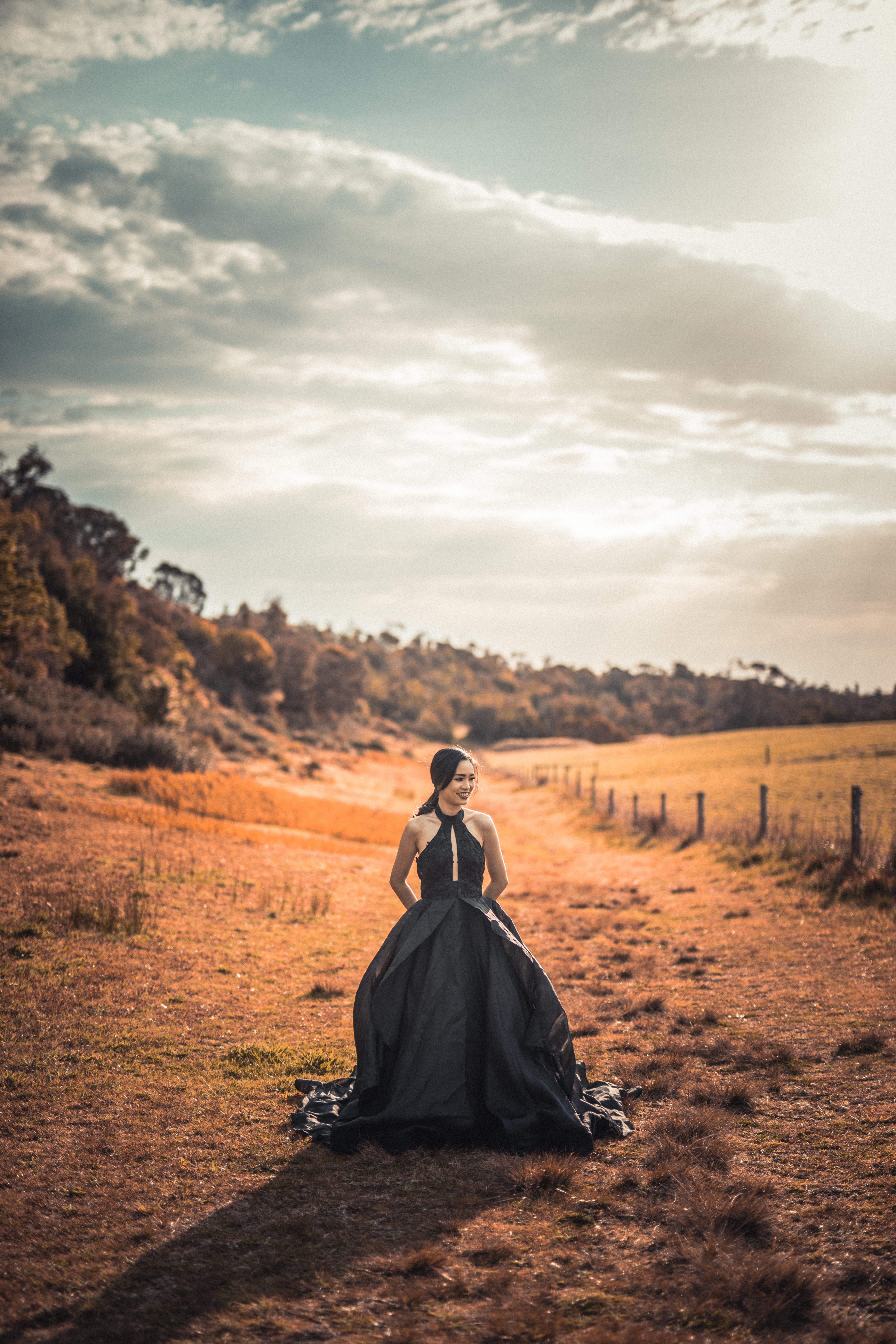 sitting, halterneck, asian, cloud - sky, dress, real people, rear view, wedding, ballgown, dramatic, queen, black, nature, bride, field, princess, tree, Phone HD Wallpaper