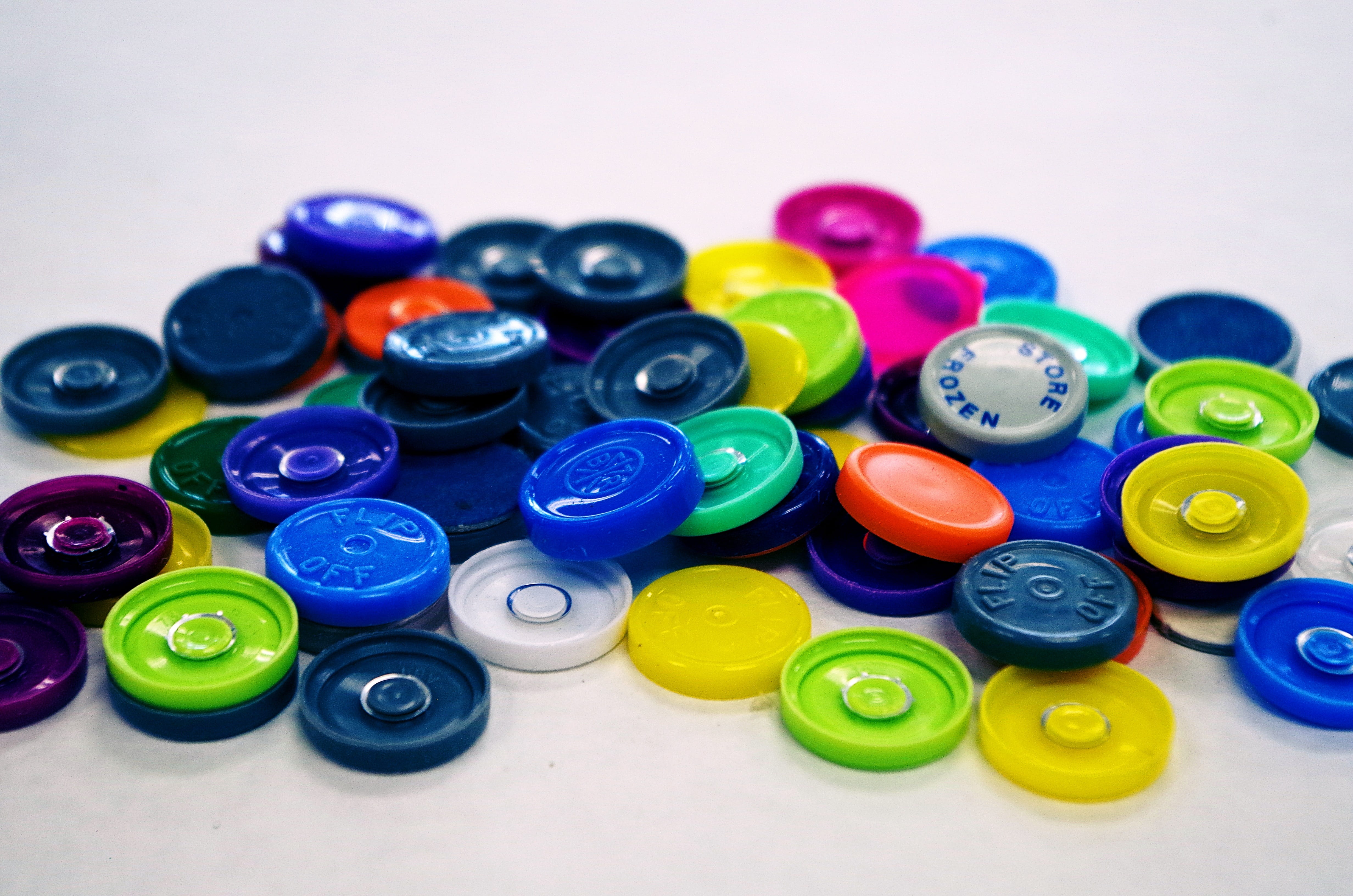 influenza, variation, still life, mmr, immunization, rubella, health, vaccine bottle cap, cap, multi colored, high angle view, large group of objects, leisure games, HD Wallpaper
