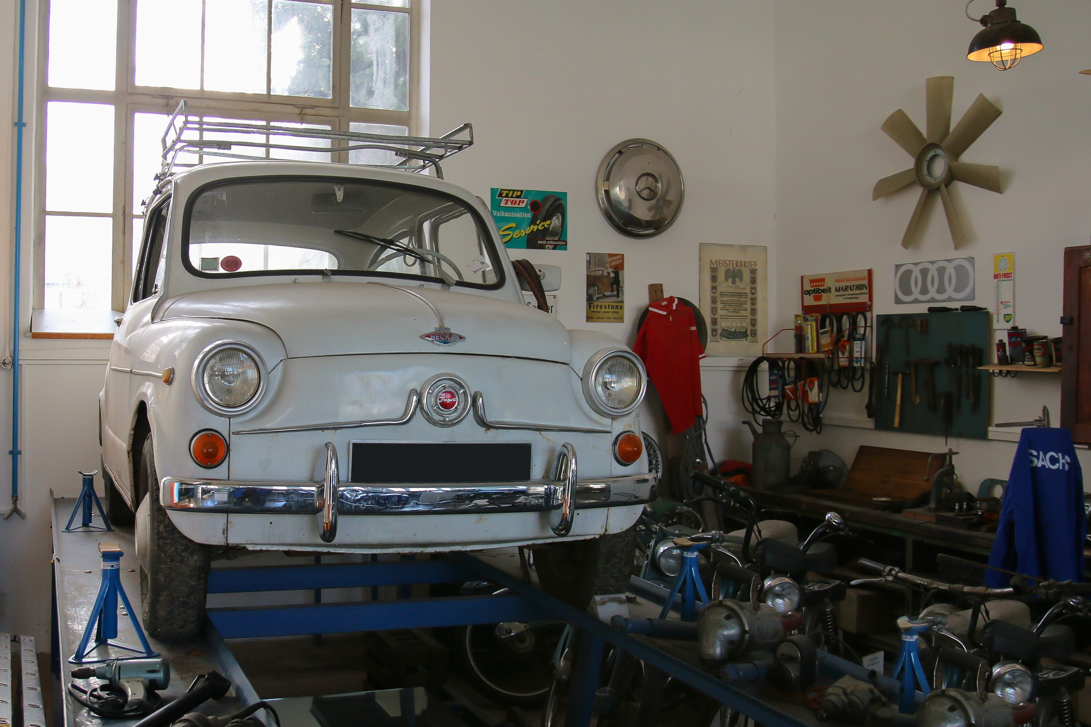 auto repair shop, standing, day, machinery, auto repair, vehicle, healthcare and medicine, occupation, auto, protection, skill, red, table, working, workshop, HD Wallpaper