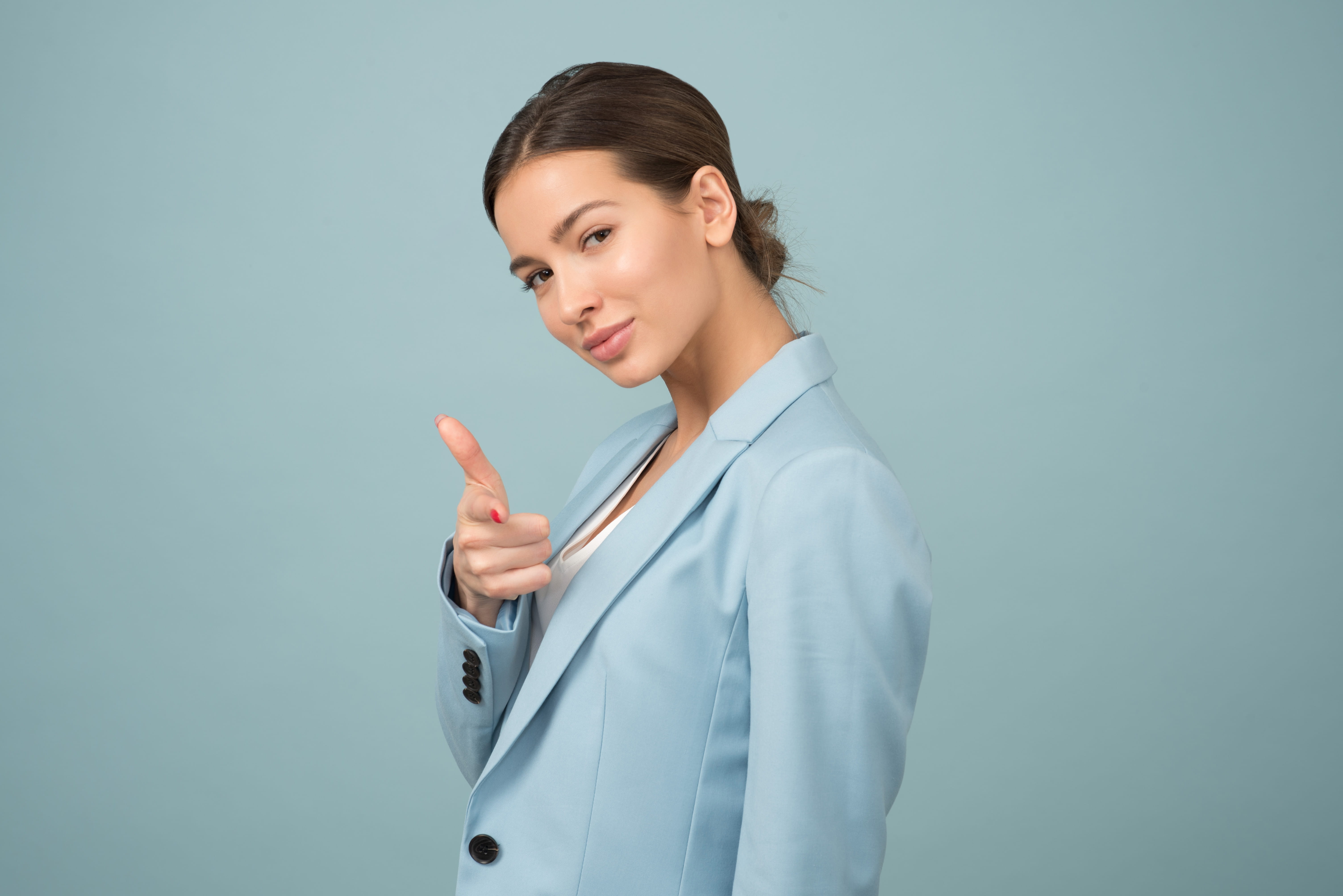business, woman, girl, facial expression, occupation, women, blue background, suit, 5K, business person, wearing, young, looking at camera, indoors, colored background, HD Wallpaper