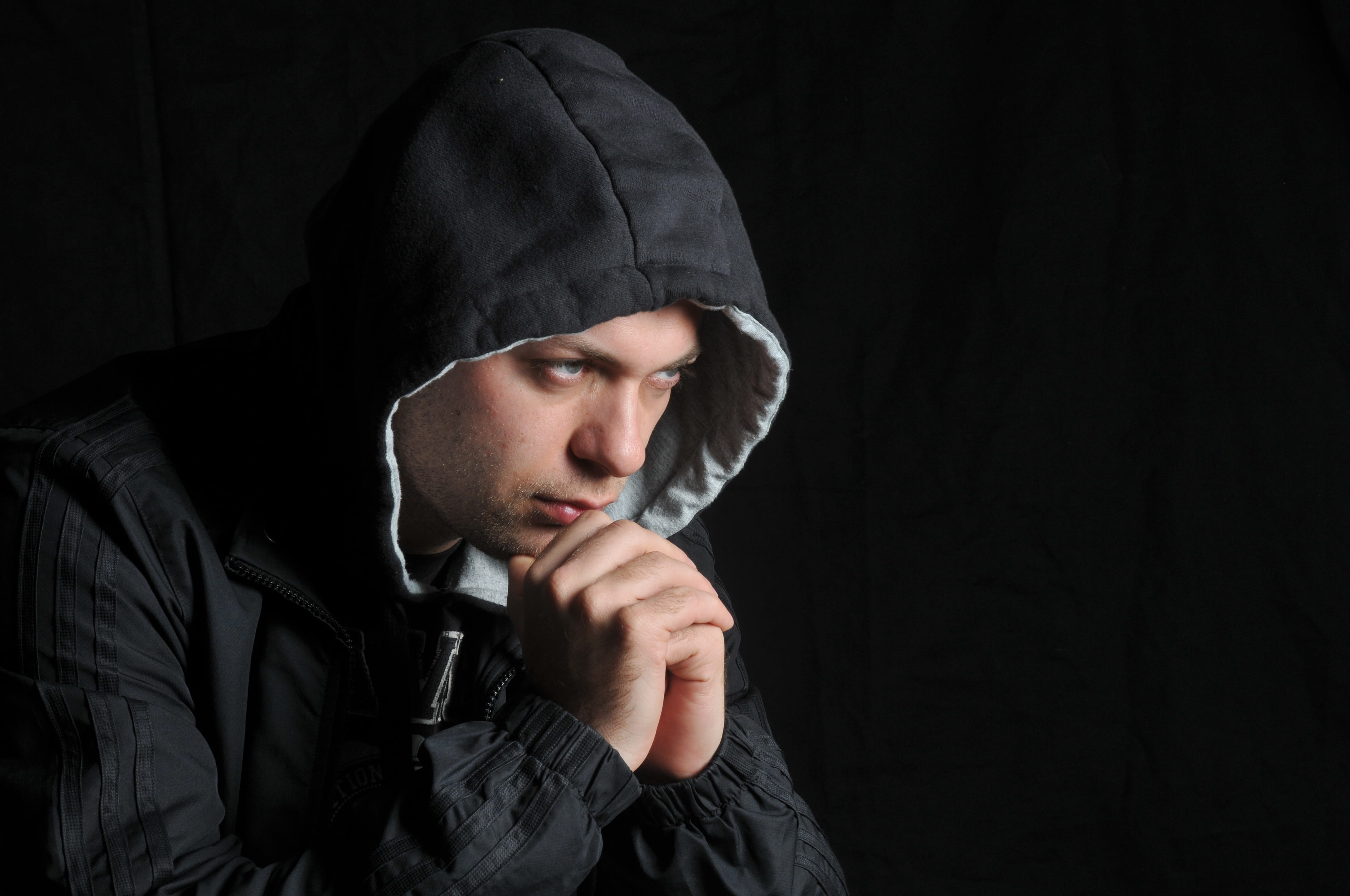 figure, pose, headshot, people, fashion, studio shot, clothing, character, contemplation, considerate, hands, young men, adult, serious, hood - clothing, HD Wallpaper