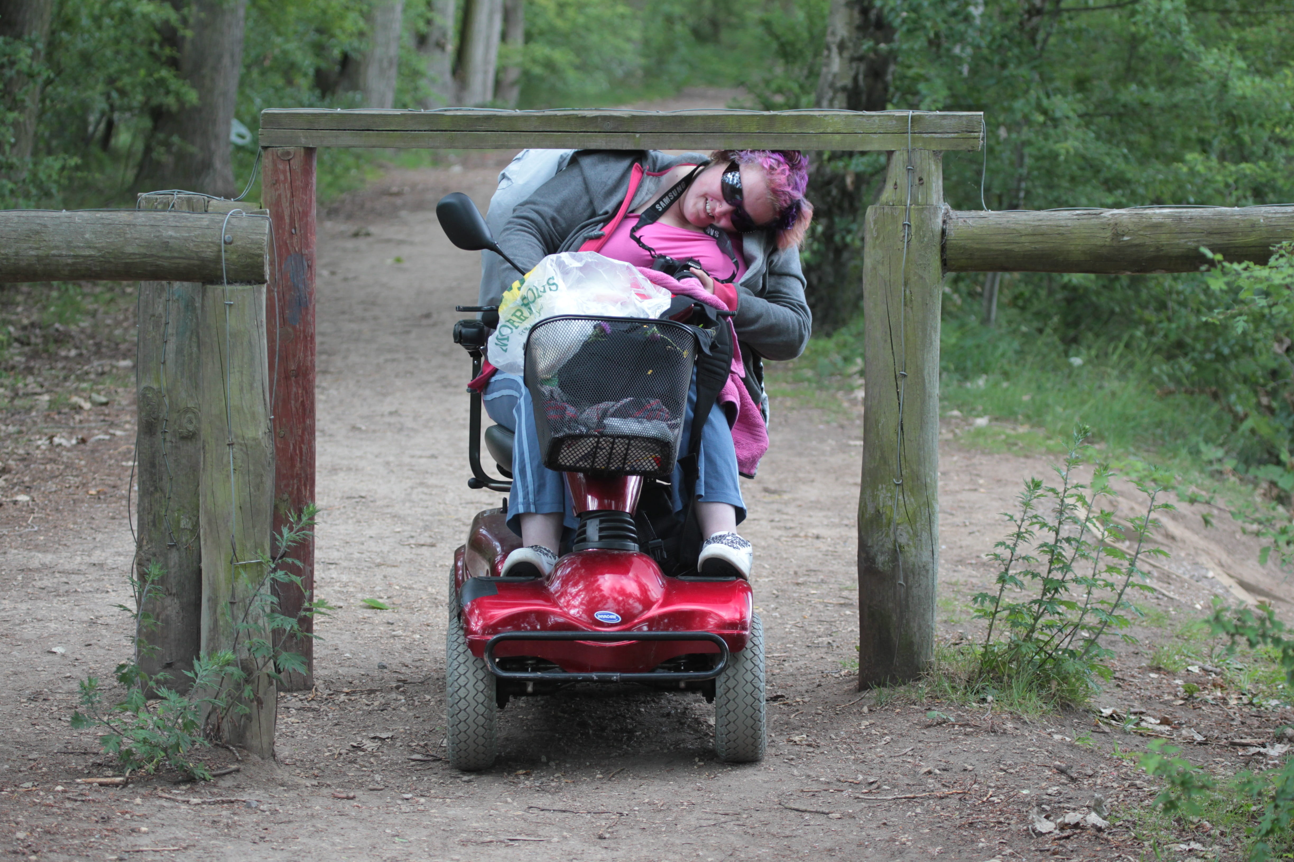 outdoors, plant, passing, real people, riding, disabled, mobility, child, accessibility, fence, scooter, 4K, leisure activity, full length, ride, wheelchair, HD Wallpaper