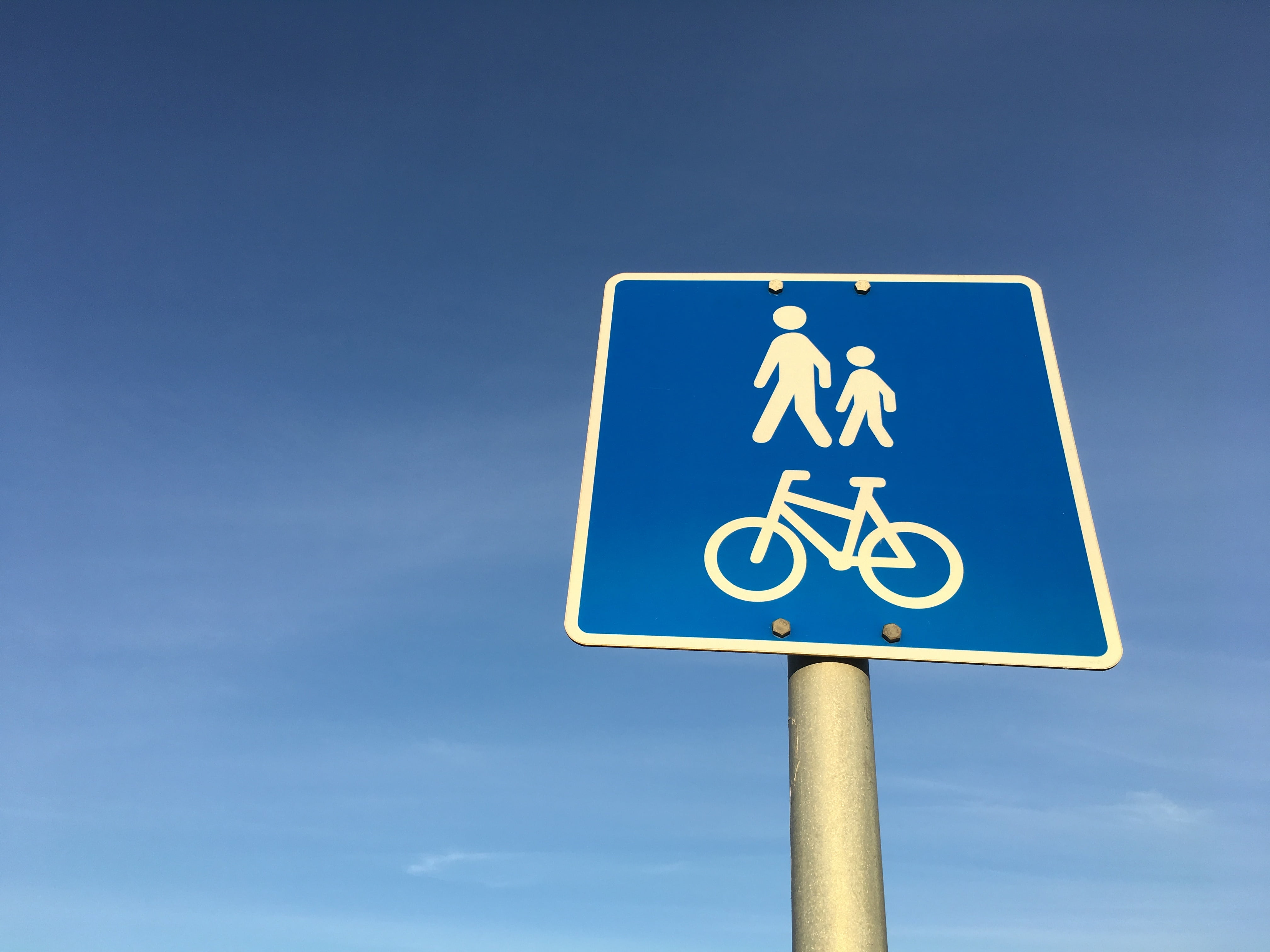 low angle view, disabled access, blue, nature, no people, sign, pedestrian, clear sky, road Sign, walkway, communication, outdoors, symbol, sky, transportation, HD Wallpaper