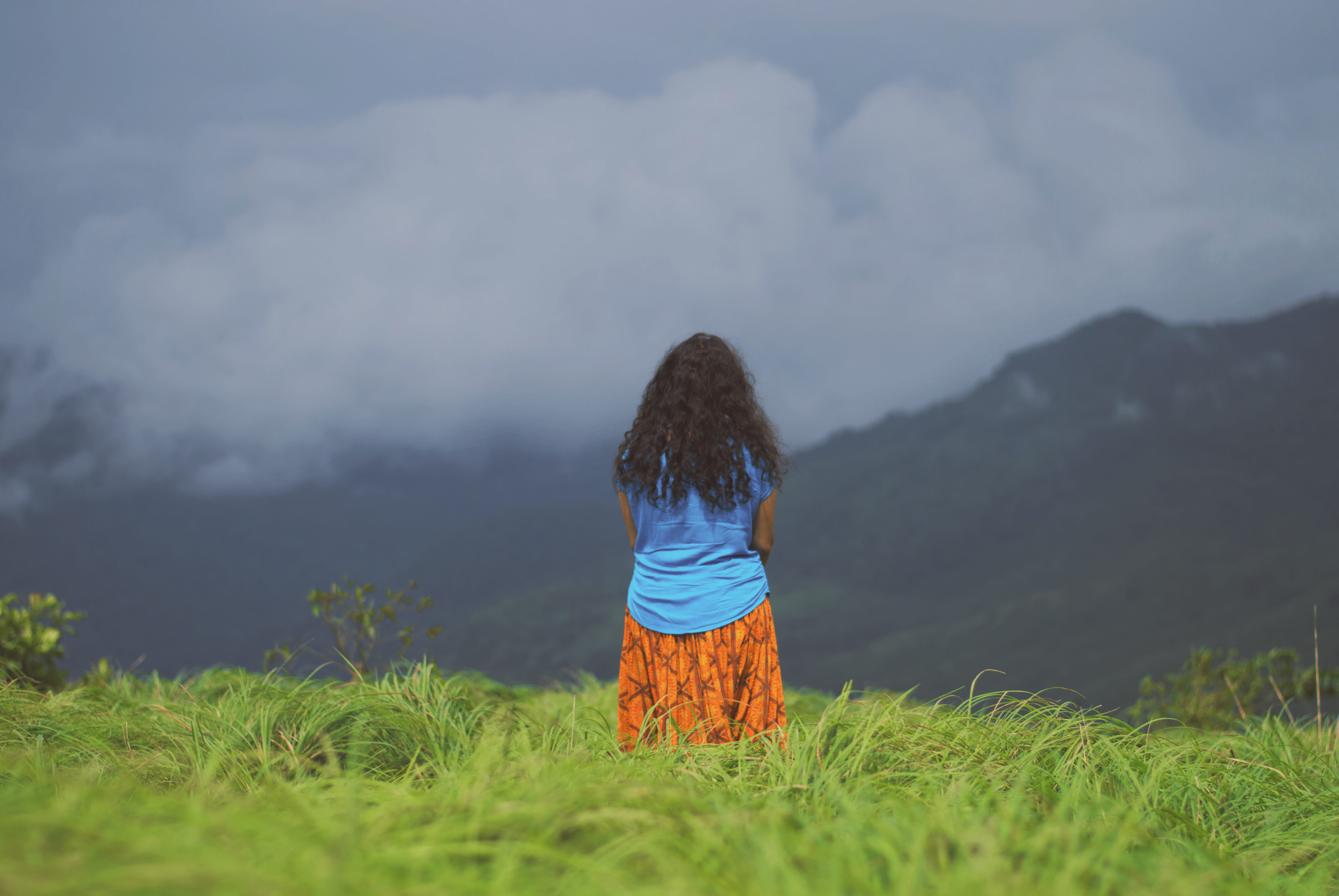 grass, alone, beauty in nature, 5K, hairstyle, outdoors, relax, lady, tranquil scene, rear view, green, nature, moody, field, mountain, hills, hill, winter, HD Wallpaper
