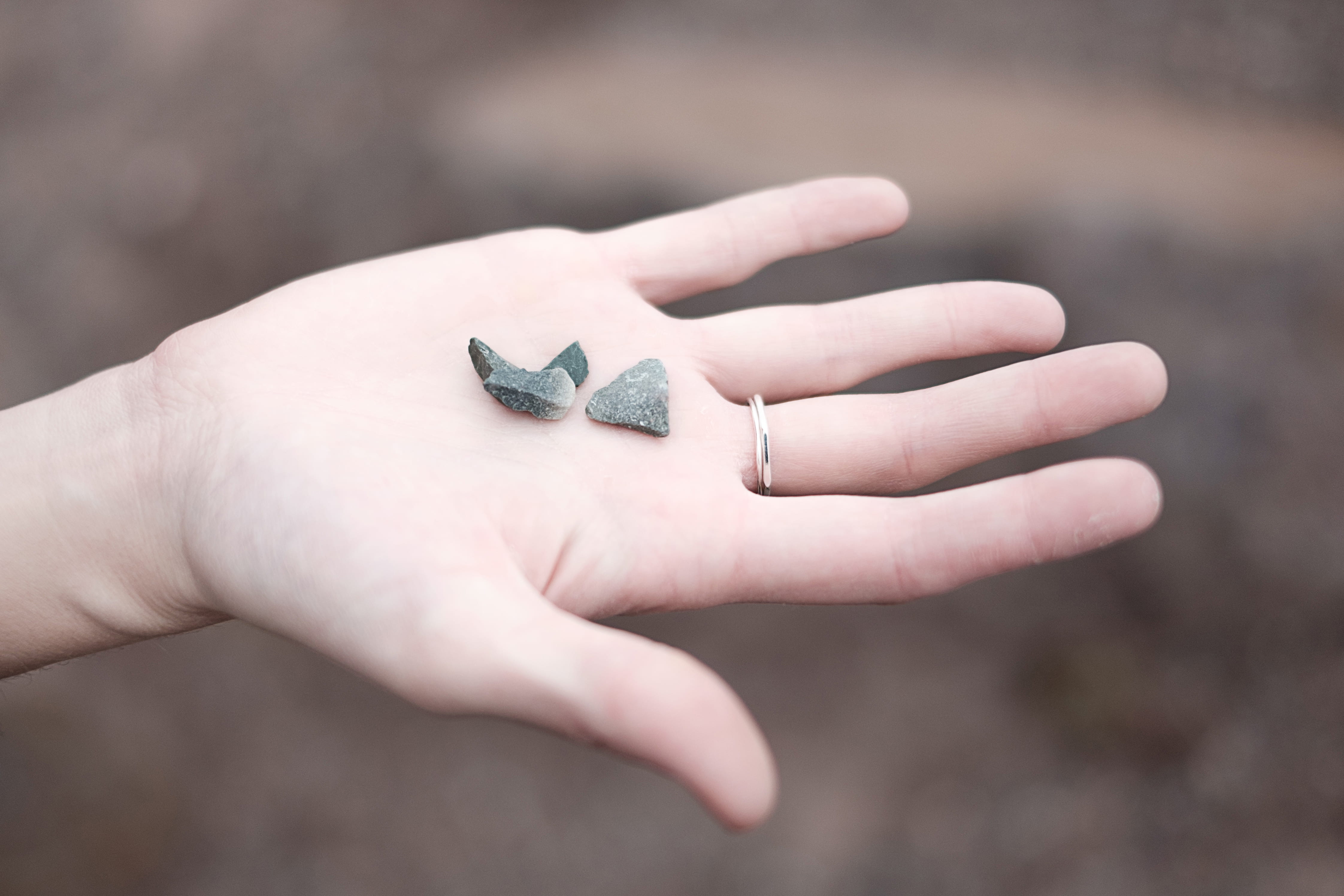 human finger, positive emotion, s, newfoundland, human hand, holding, day, close-up, selective, focus on foreground, outdoors, focus, stone, heart shape, HD Wallpaper