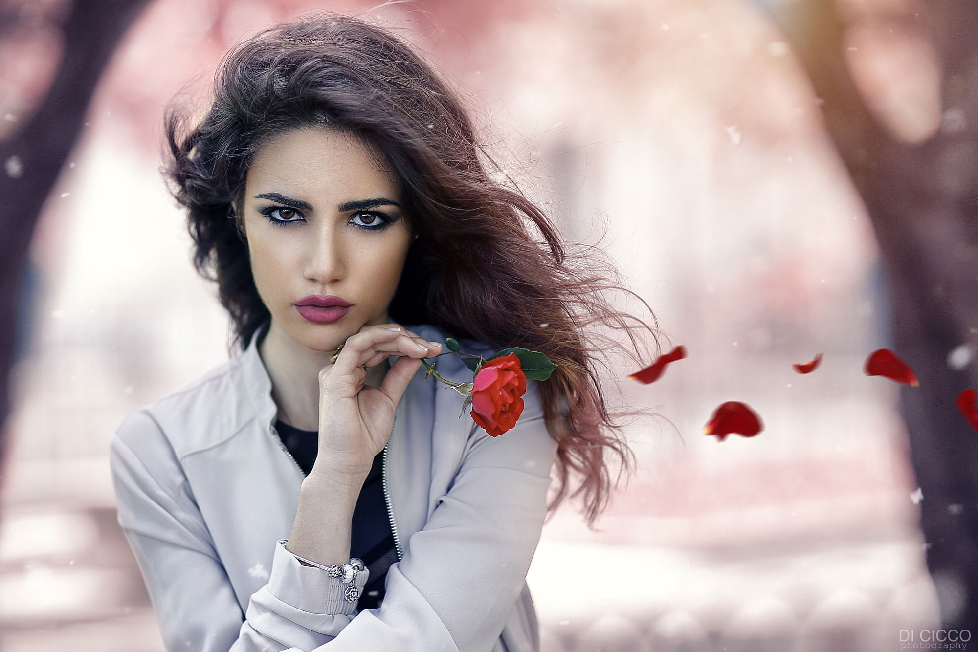 petals, red lipstick, dark hair, 1080P, wind, flowers, Alessandro Di Cicco, bracelets, portrait, gray, long hair, rose, blouse, women, HD Wallpaper