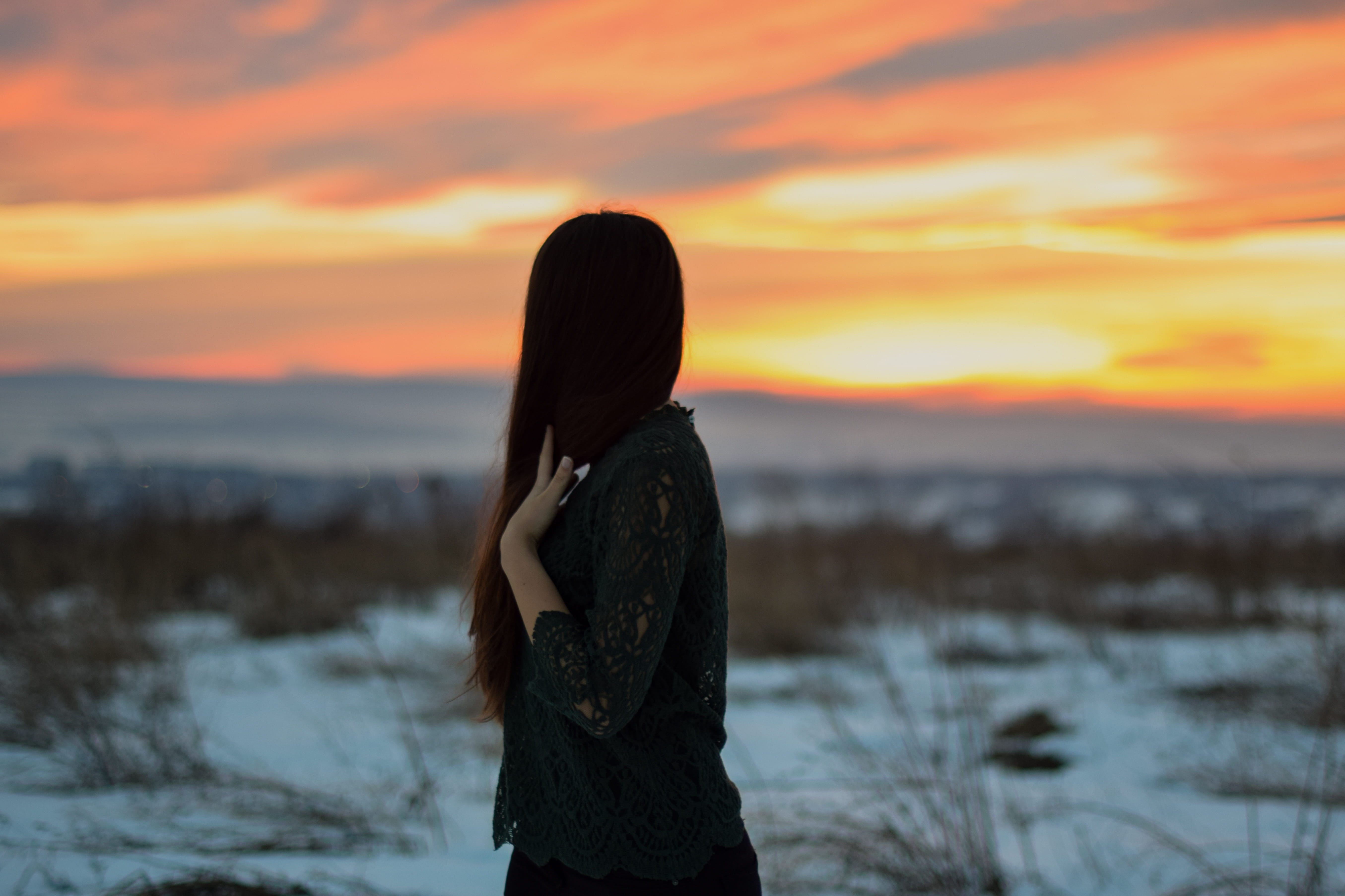 adult, hair, focus on foreground, outdoor, one person, 5K, girl, human, snow, hairstyle, sun, dusk, sky, lifestyles, unseen, looking at view, three quarter length, HD Wallpaper
