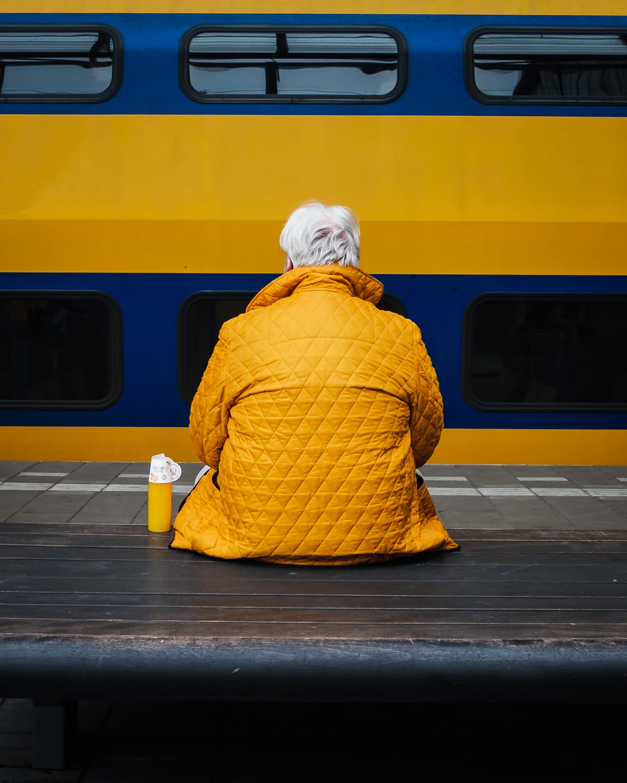 rail transportation, real people, land vehicle, bottle, color, person, orange juice, rear view, top, man, outdoors, clothing, 1080P, candid, minimal, jacket, Phone HD Wallpaper