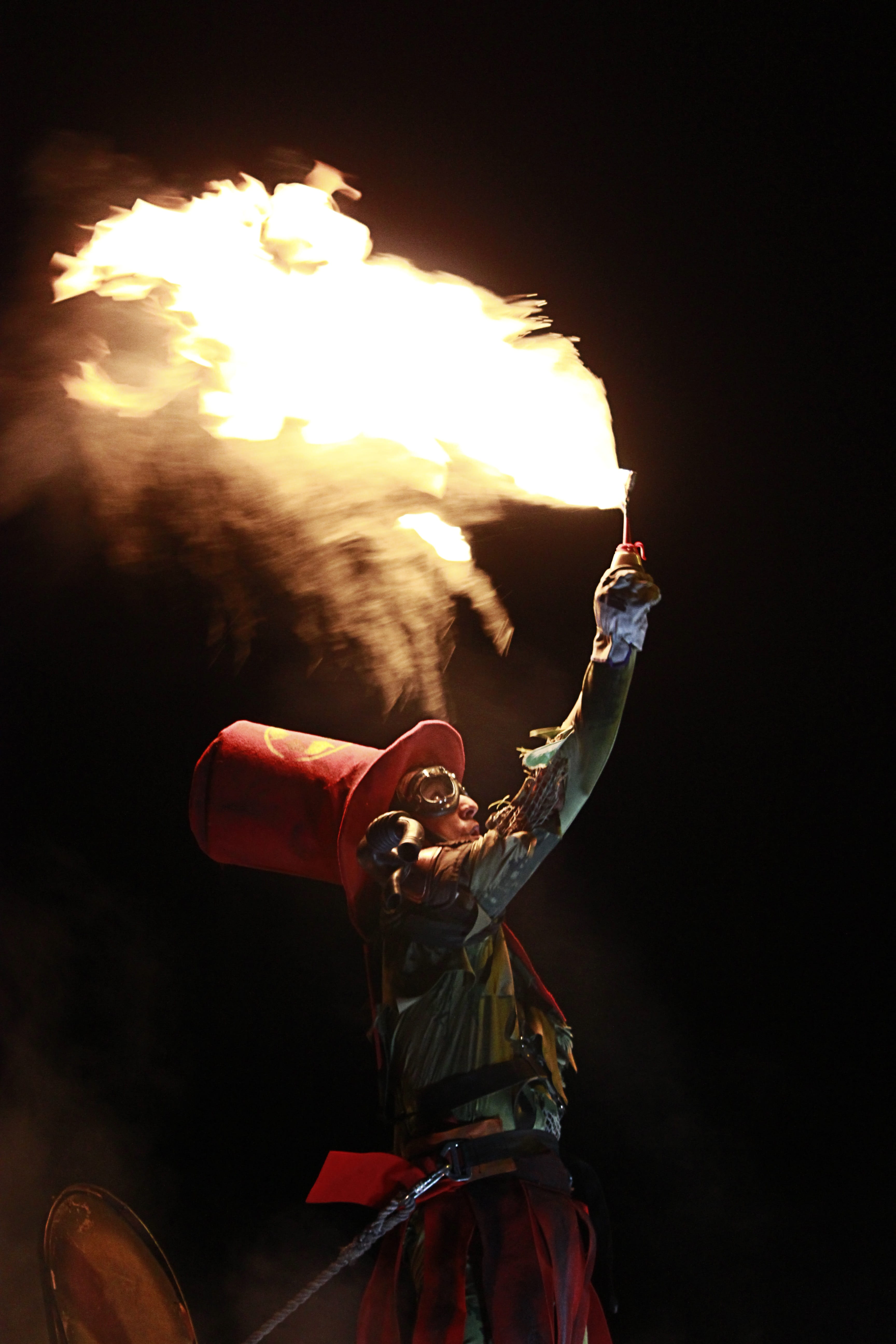 fire, adult, one person, one man only, flame, holding, burning, Fire, rear view, performing arts event, nature, arms raised, dancing, motion, human arm, Phone HD Wallpaper