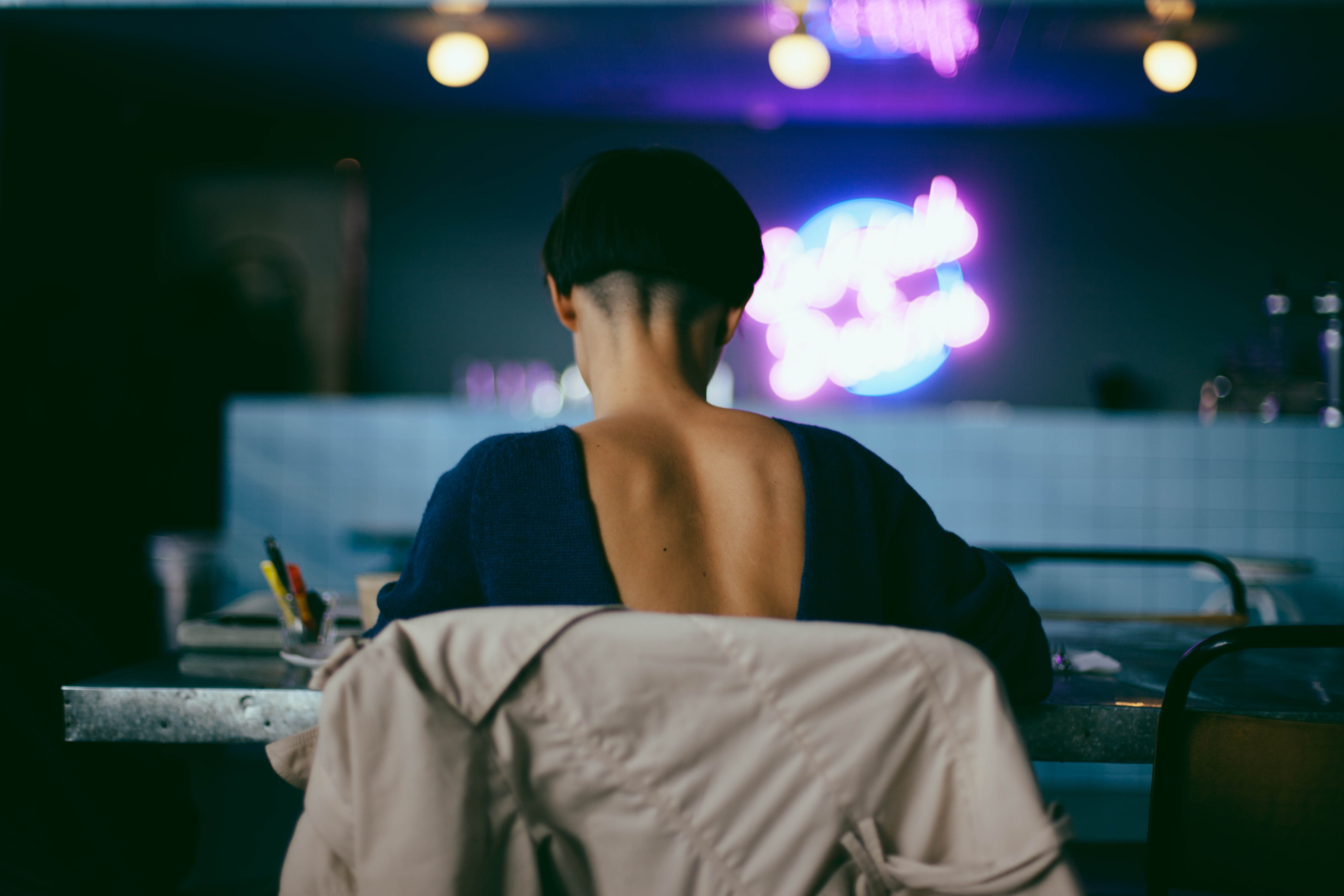 female, night, illuminated, photography, black hair, ofg, one person, lifestyles, seat, lighting equipment, focus, business, women, electric lamp, selective, HD Wallpaper