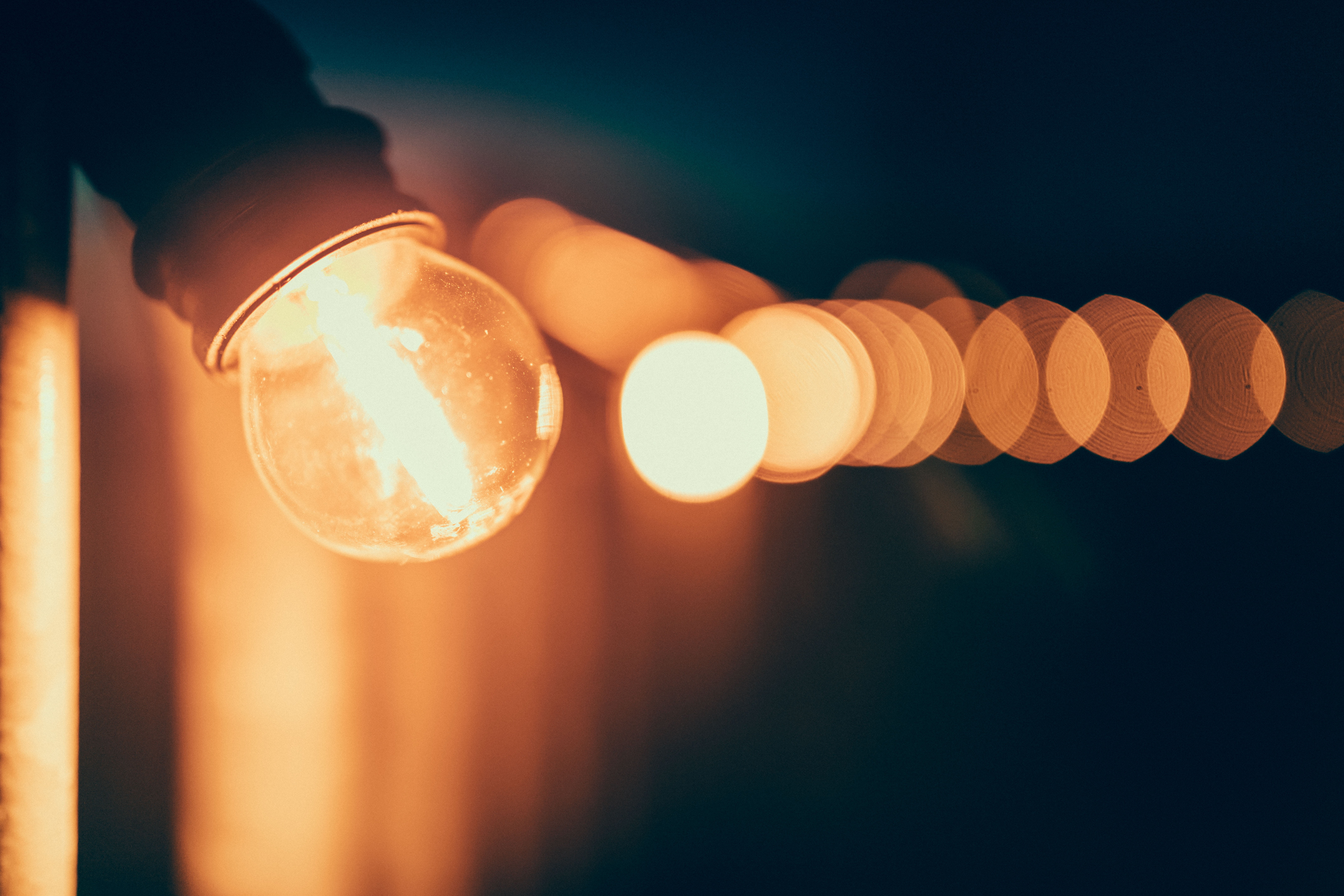 orange color, turned, lamp, blur, night, human body part, electric lamp, brown, bokeh, yellow, focus on foreground, technology, human limb, human hand, HD Wallpaper