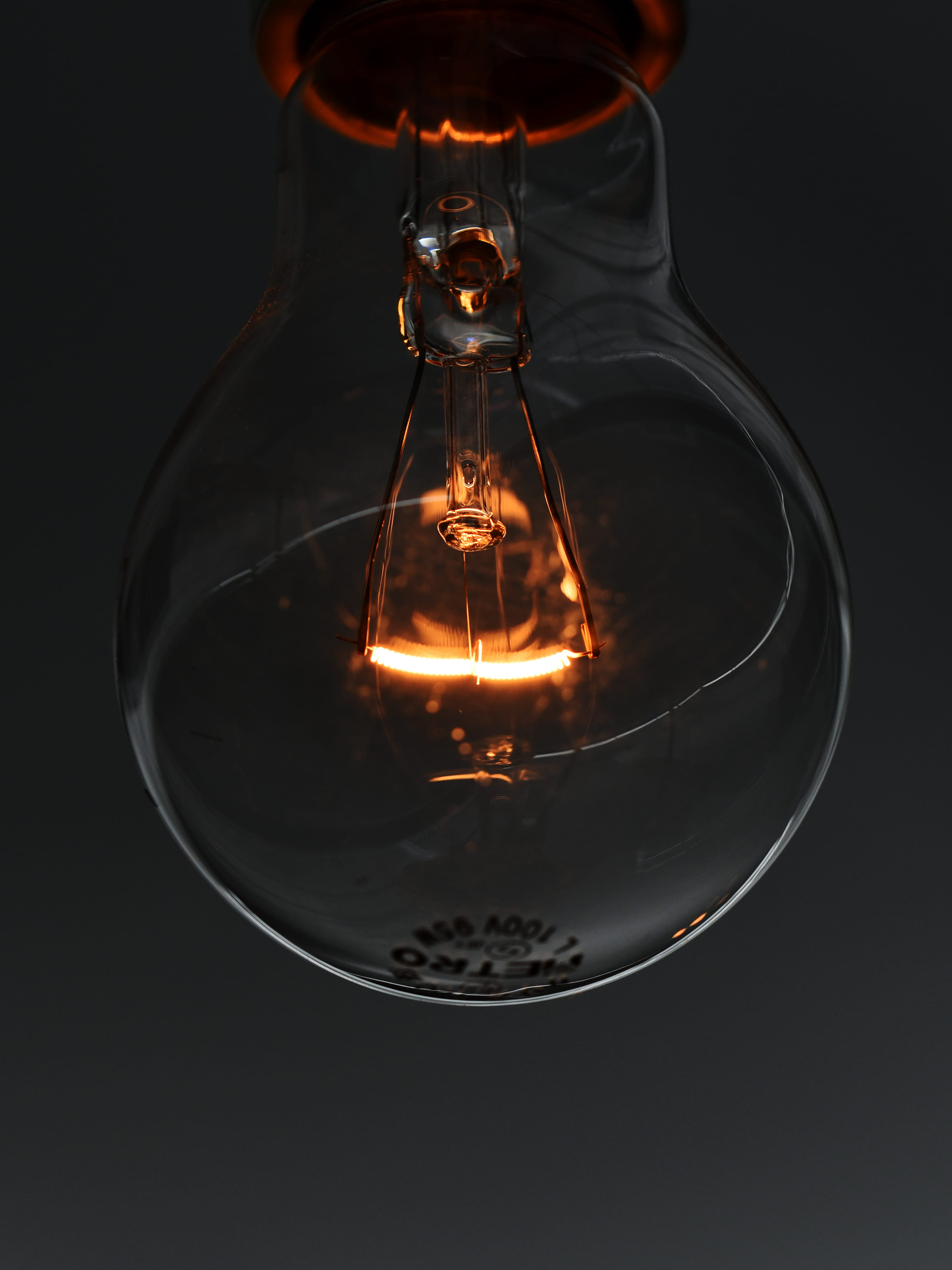 aoyama, incandescent, interior, studio shot, dark, macro, glass, black, black background, goblet, glowing, curve, electric light, bulb, closeup, 4K, lightbulb, Phone HD Wallpaper