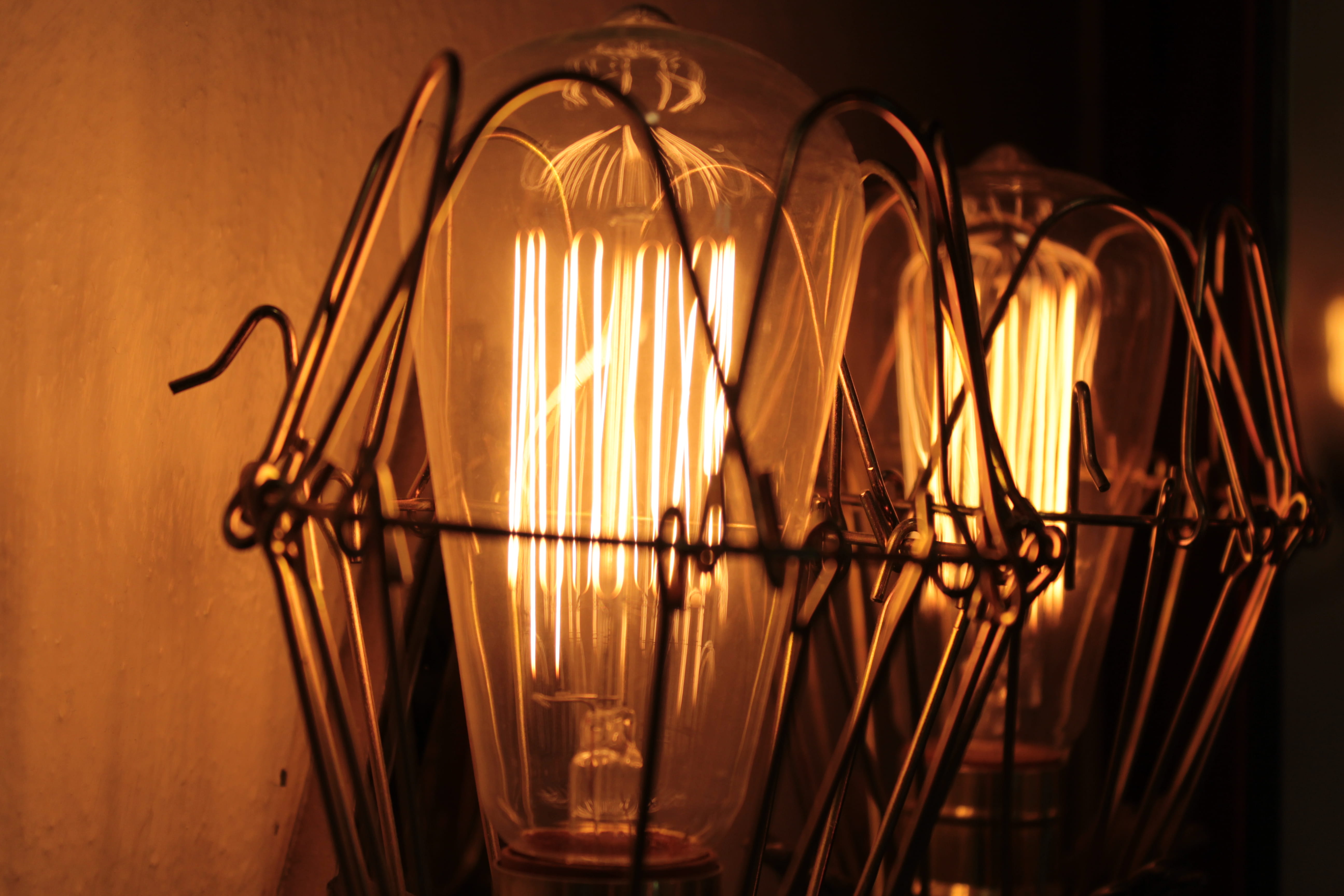 glowing, connection, focus on foreground, light - natural phenomenon, dark, light, light bulb, electric lamp, indoors, metal, transparent, close-up, orange color, HD Wallpaper