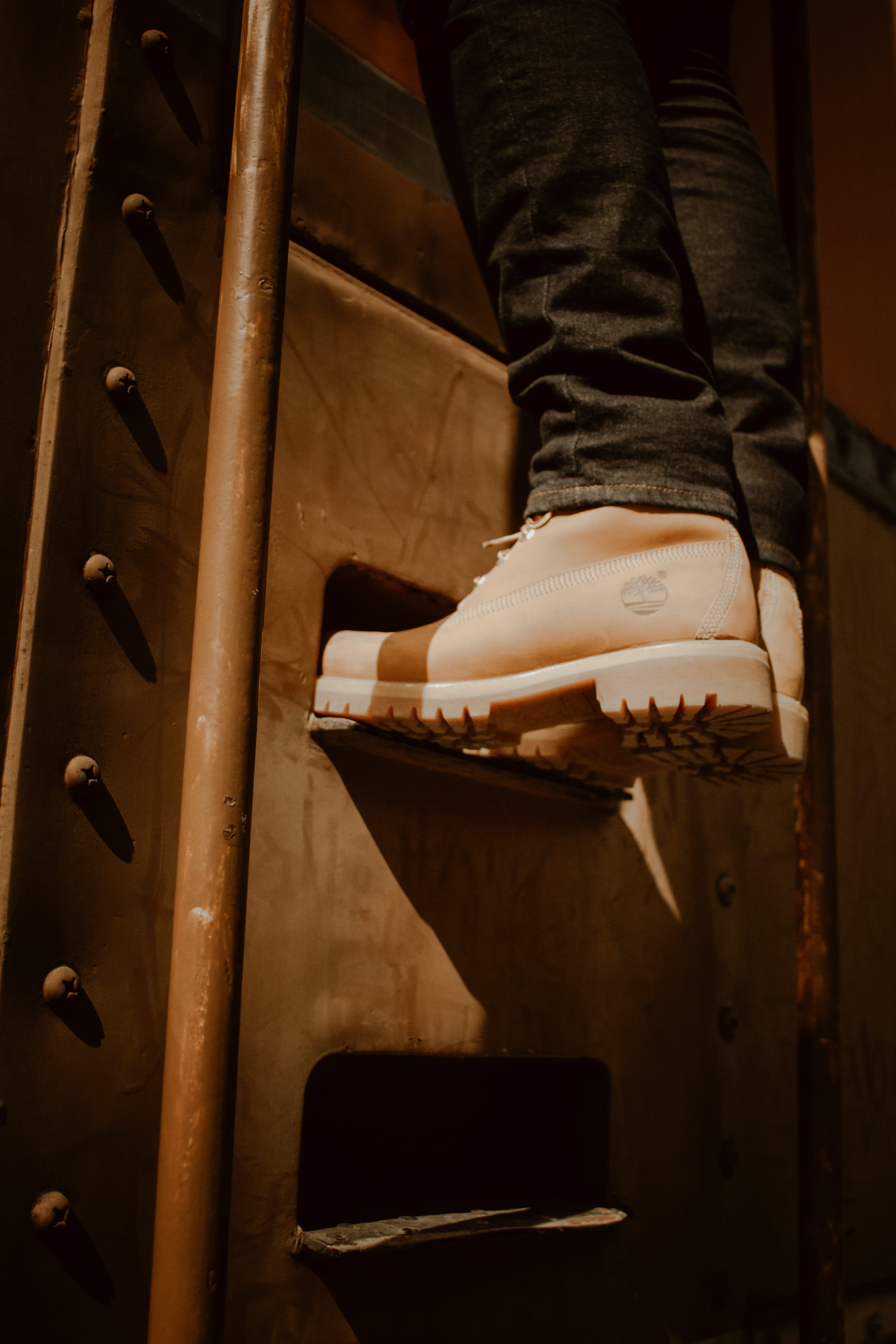 timberland, stair, human body part, boots, lifestyles, boot, climbing, standing, jeans, wearing, human leg, metal, seat, unrecognizable person, low section, Phone HD Wallpaper