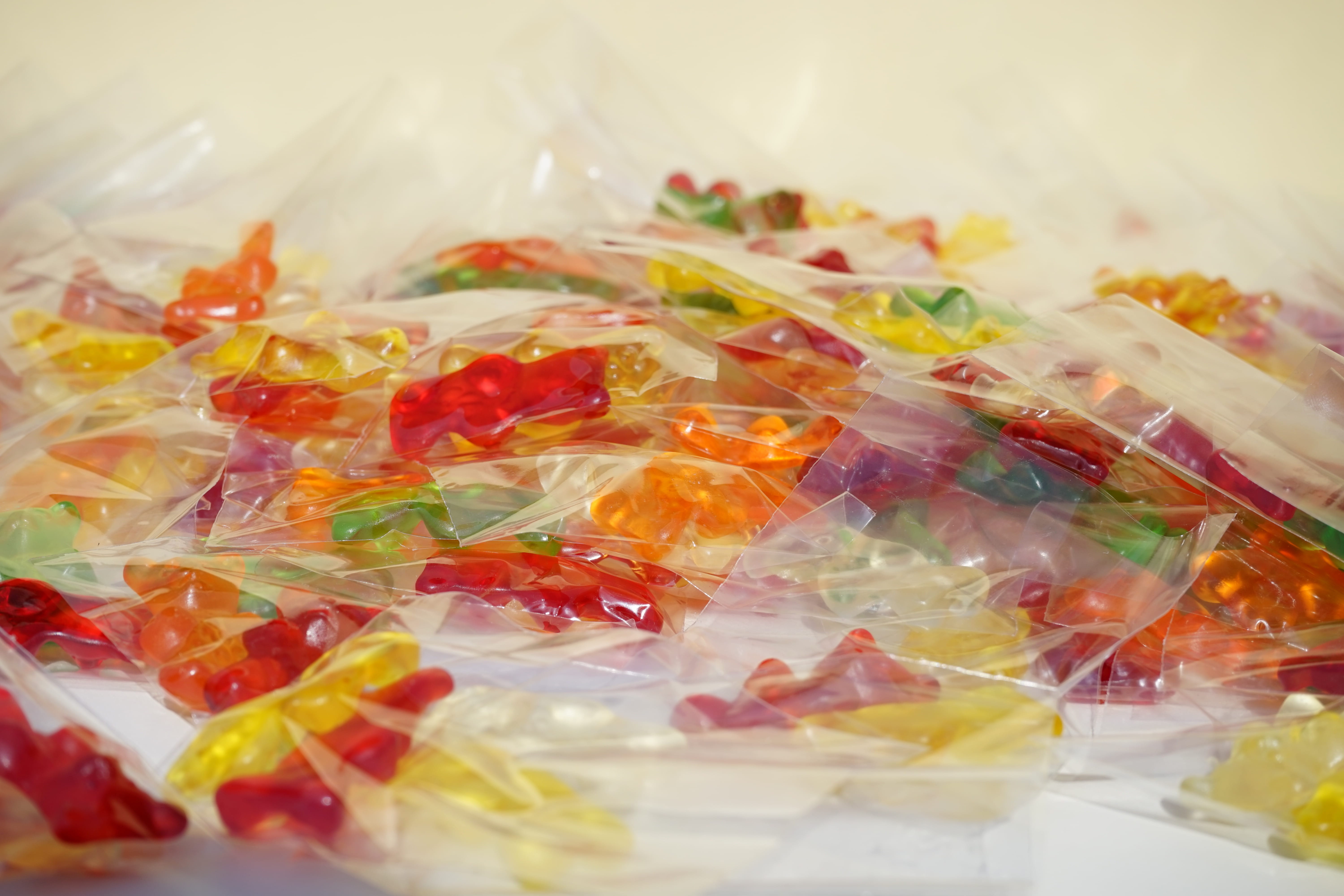 temptation, gelatin, healthy eating, fruit jelly, studio shot, fruit gums, no people, polythene, Gummi Bears, colorful, indoors, gold bears, still life, HD Wallpaper