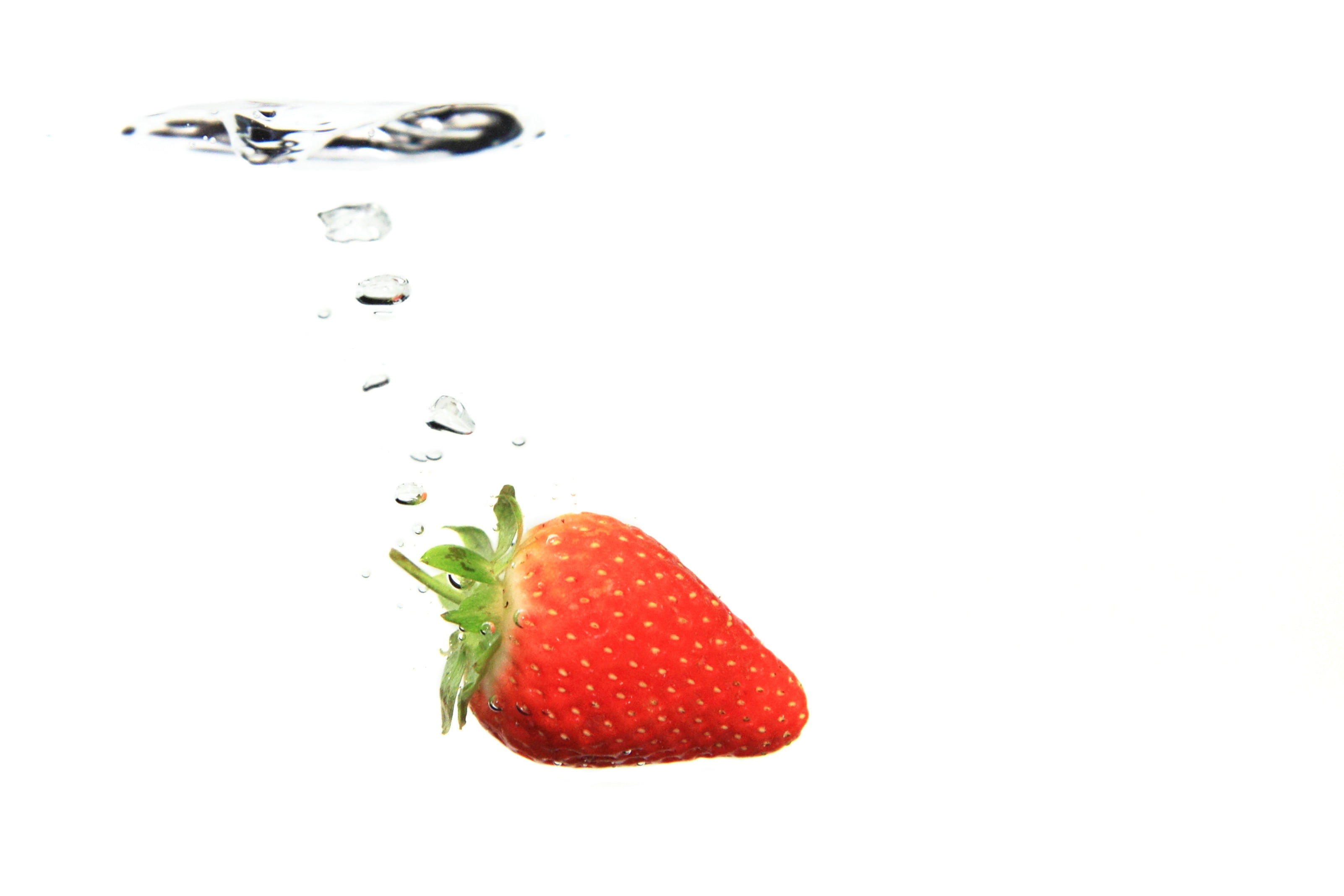 wet, aqua, strawberry, droplet, falling, nature, copy space, white background, background, white, no people, motion, clean, freshness, abstract, healthy eating, HD Wallpaper