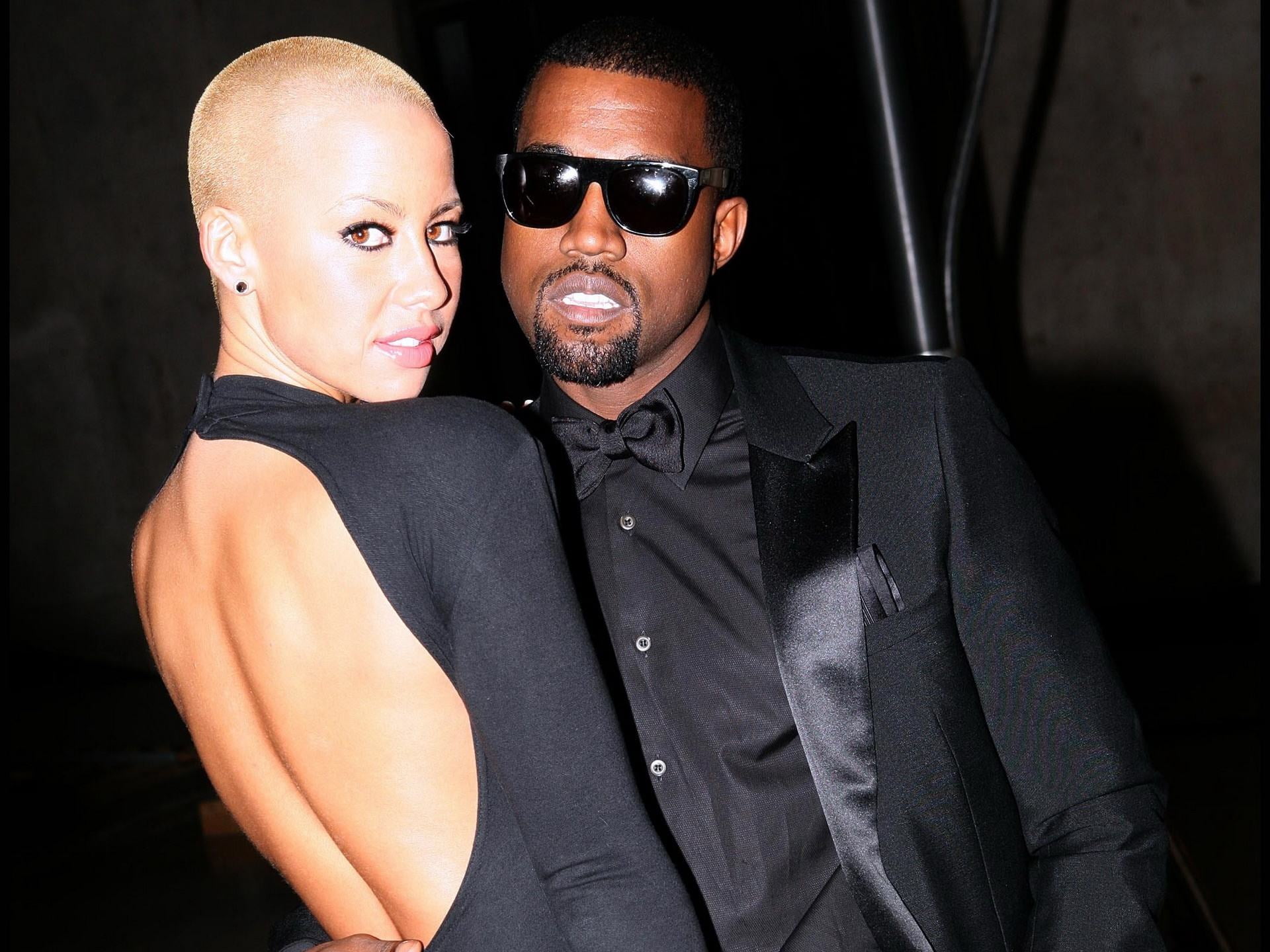 amber rose, mid adult, kanye west, men, adult, young men, couple, 1080P, studio shot, black background, bodyguard, aggression, singers, two people, mid adult men, HD Wallpaper
