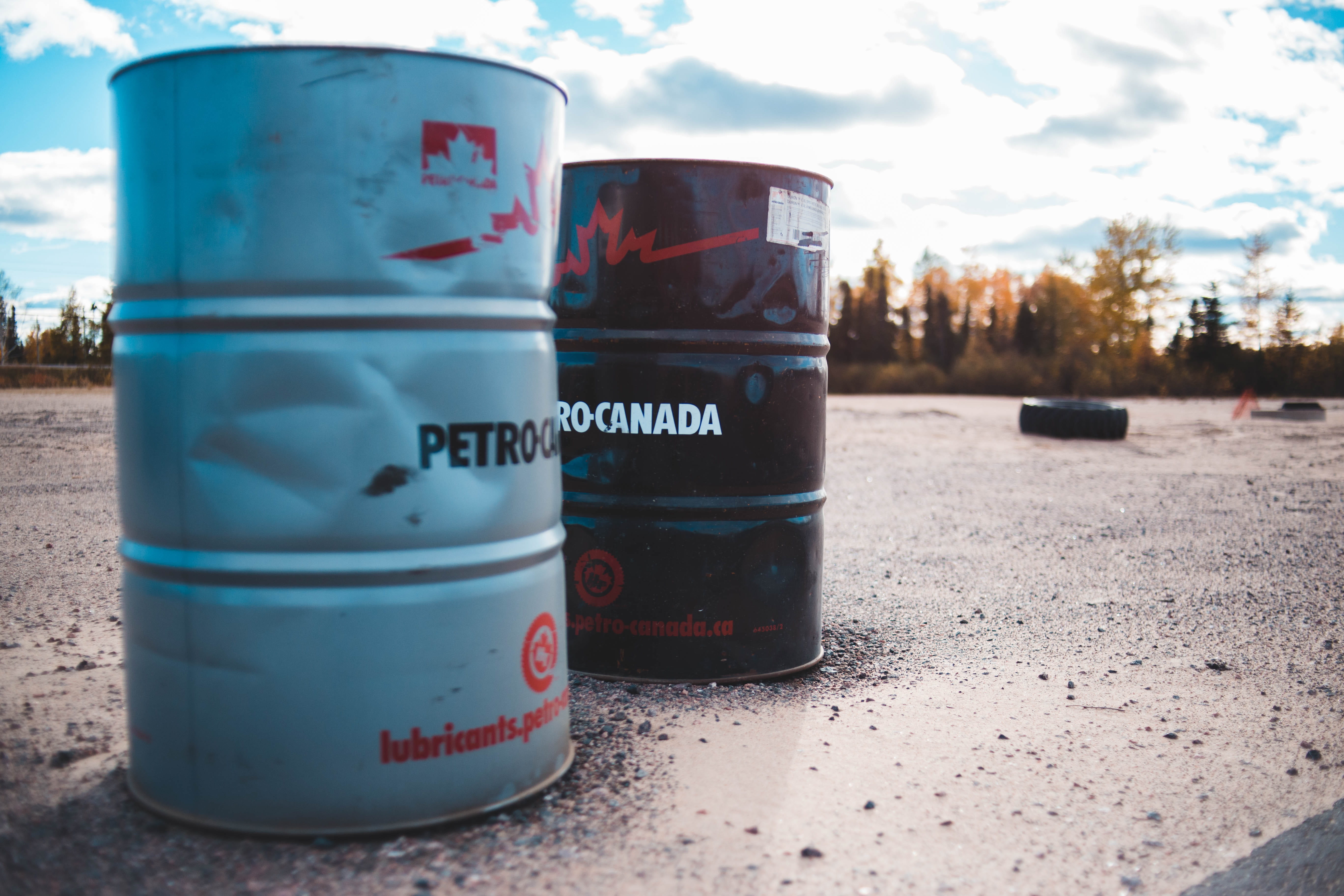 sunlight, focus on foreground, bottle, rocks, black, outdoors, close-up, no people, barrel, gas, milk, day, communication, container, keg, nature, city, HD Wallpaper