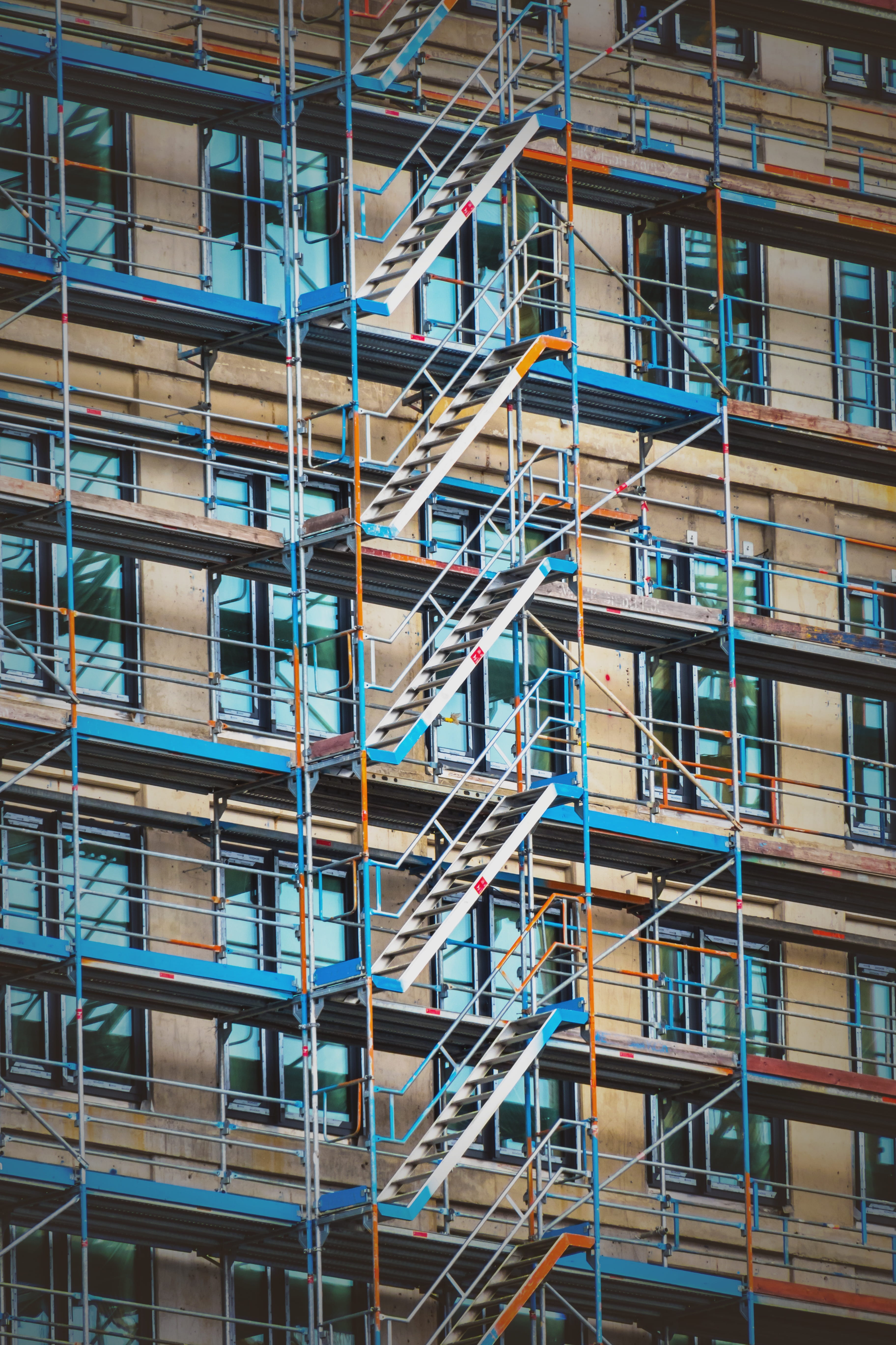 site, scaffold, backgrounds, construction industry, blue, building exterior, day, built structure, residential district, metal, facade, scaffolding, new building, Phone HD Wallpaper