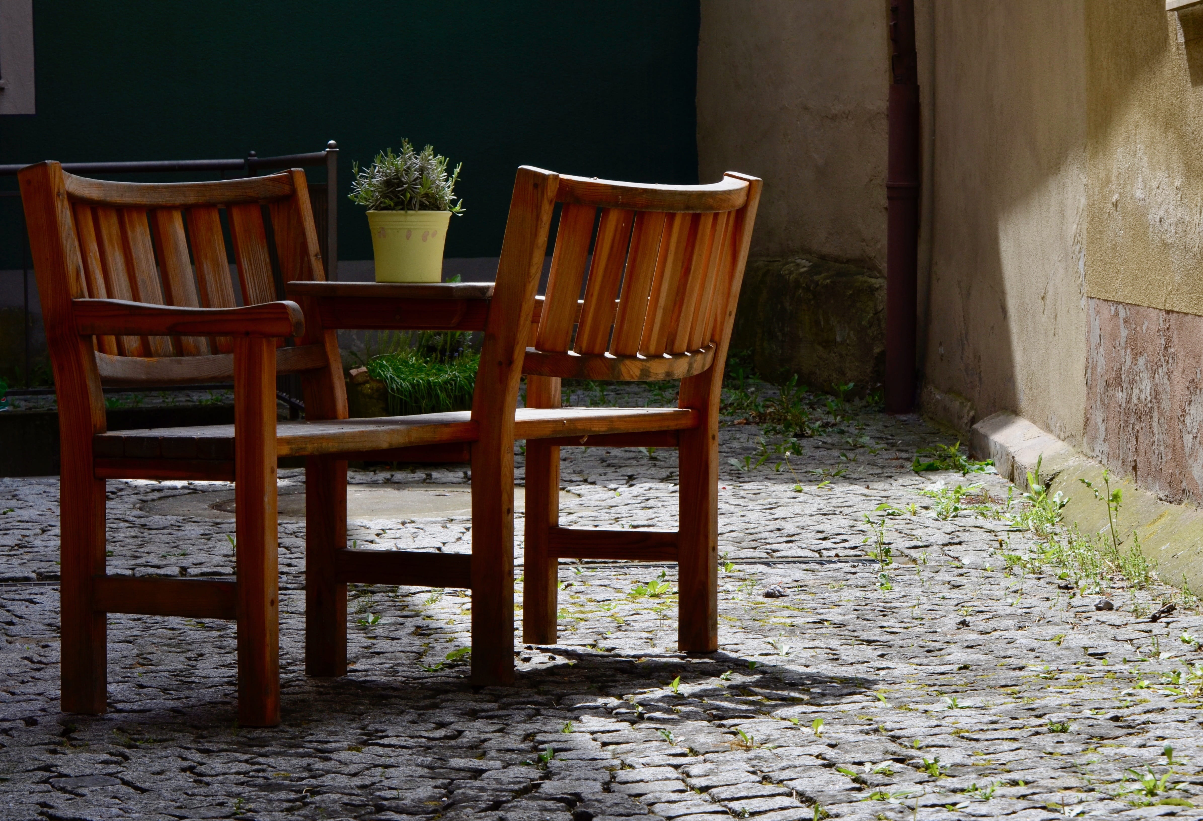 table, no people, rest, plant, sunny, outdoors, paving stone, chair, sunlight, day, 4K, cobblestone, wall - building feature, nature, wood - material, HD Wallpaper