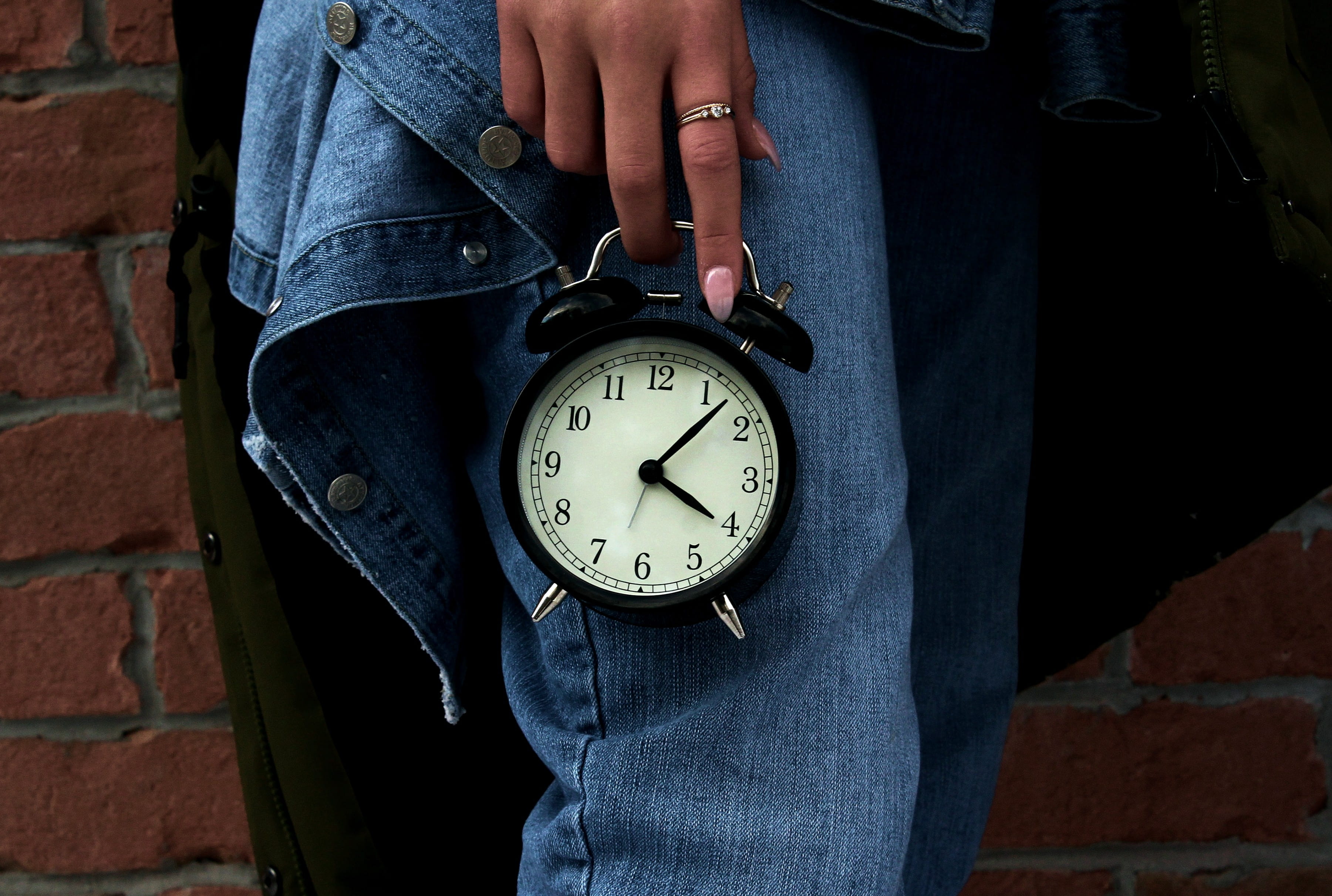 2K, architecture, human body part, clock, brick, casual clothing, focus on foreground, midsection, girl, leisure activity, jeans, real people, standing, HD Wallpaper