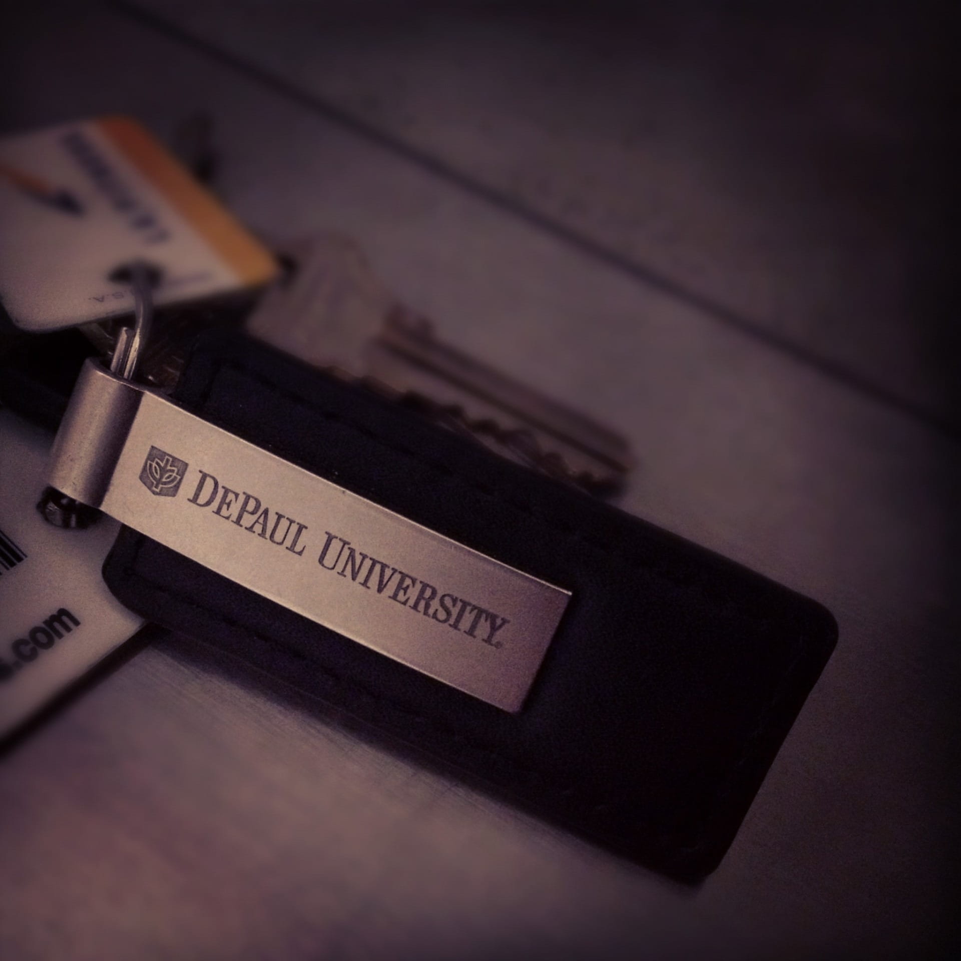 selective focus, depaul, passport, keys, design, focus on foreground, University, travel, Depaul, text, university, technology, emblem, paper, indoors, Phone HD Wallpaper