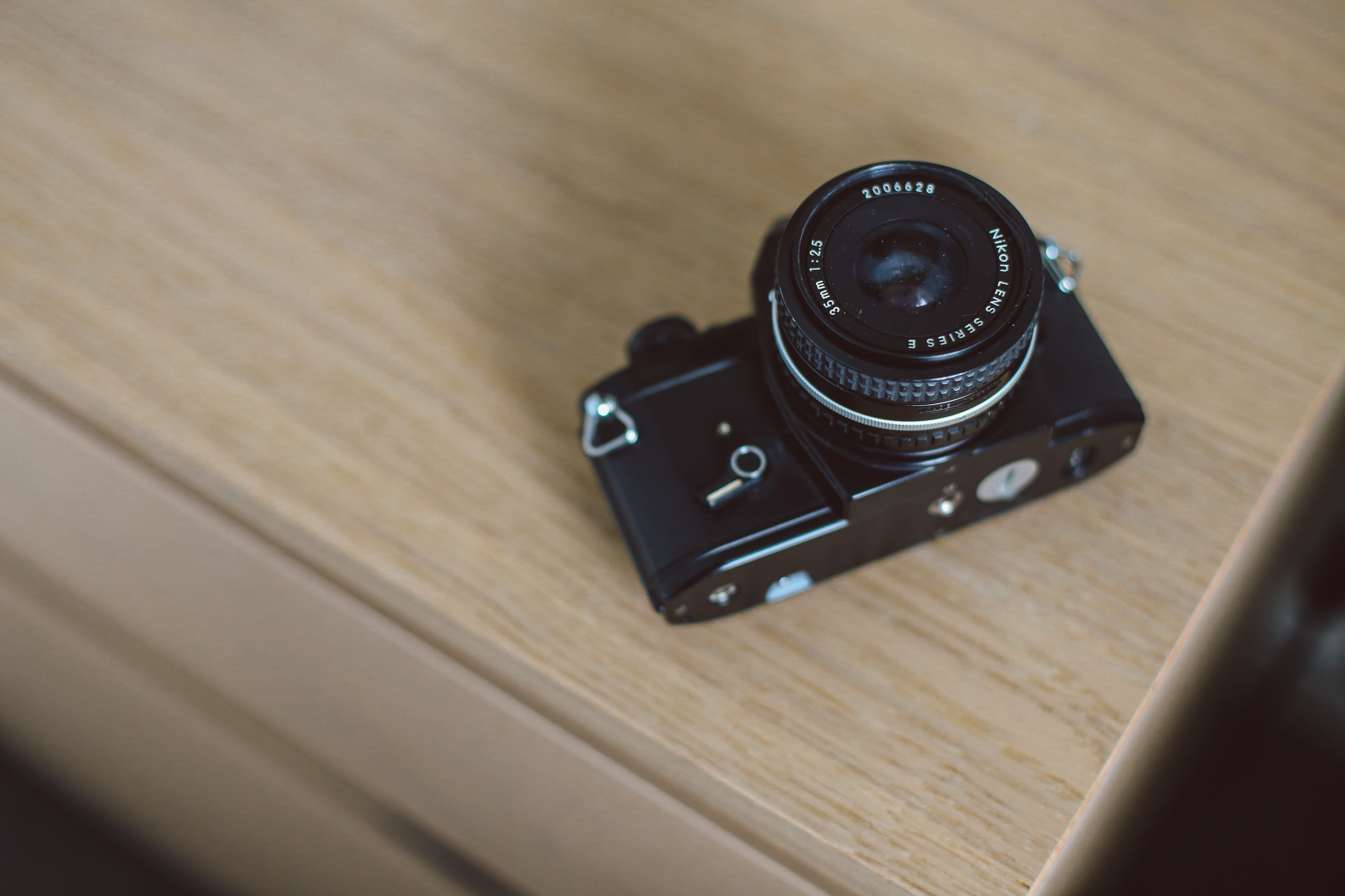 still life, close-up, surface, single object, black color, no people, high angle view, analog, camera, number, lens, brown, shoot, 5K, photographic equipment, HD Wallpaper