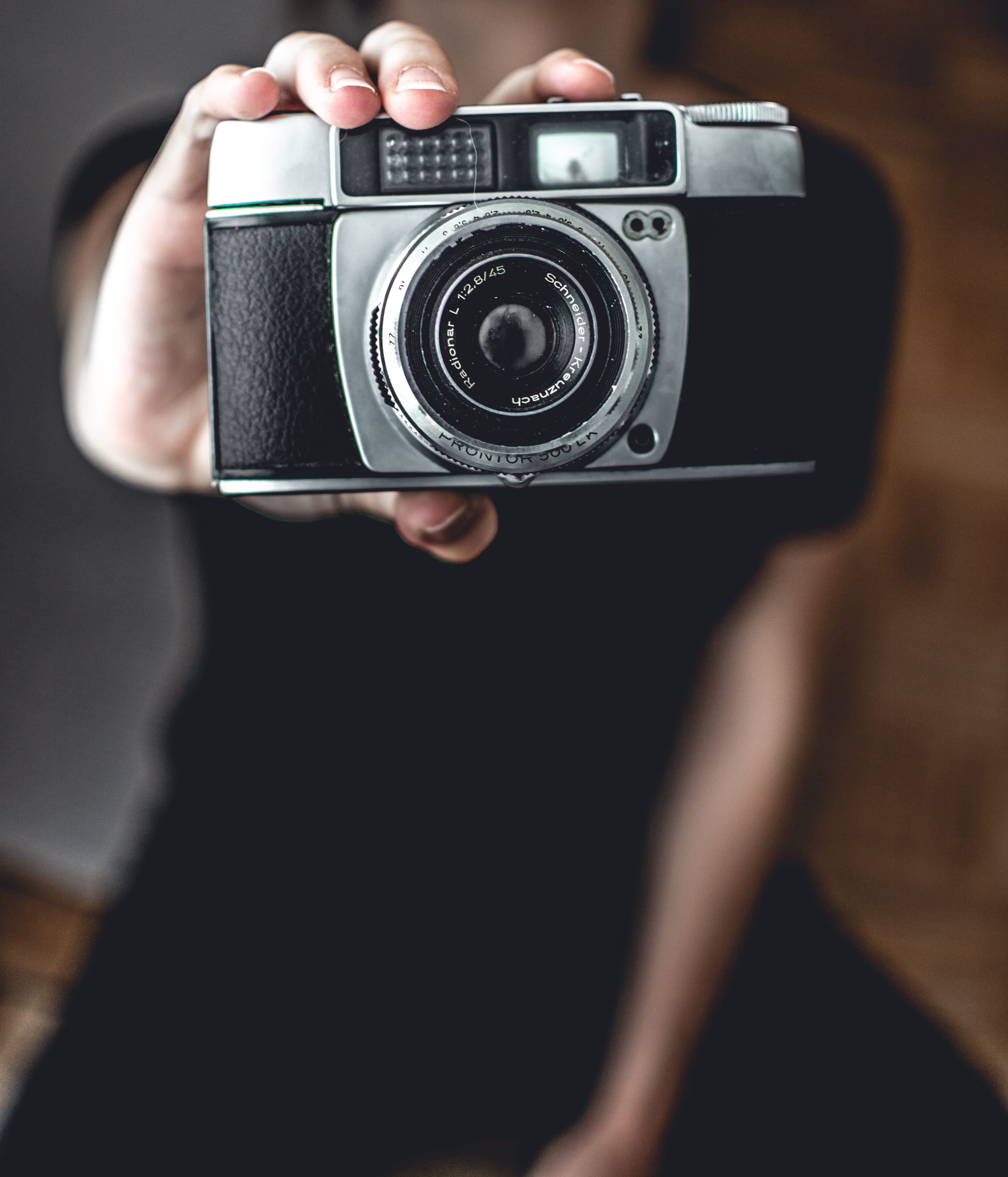 photographic equipment, black, film camera, person, photography themes, woman, digital camera, one person, indoors, austria, camera, fashion, hold, black background, Phone HD Wallpaper